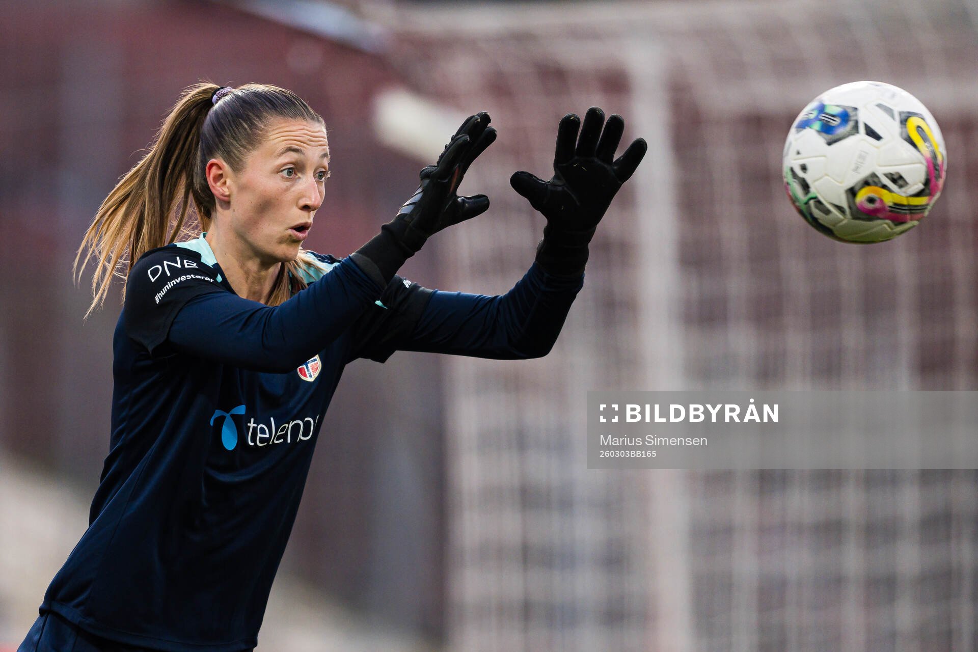Goalkeeper Cecilie Hauståker Fiskerstrand of Norway warms
