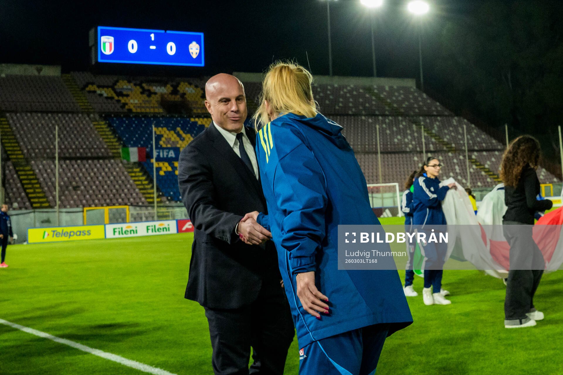Head coach Andrea Soncin of Italy shakes hands with