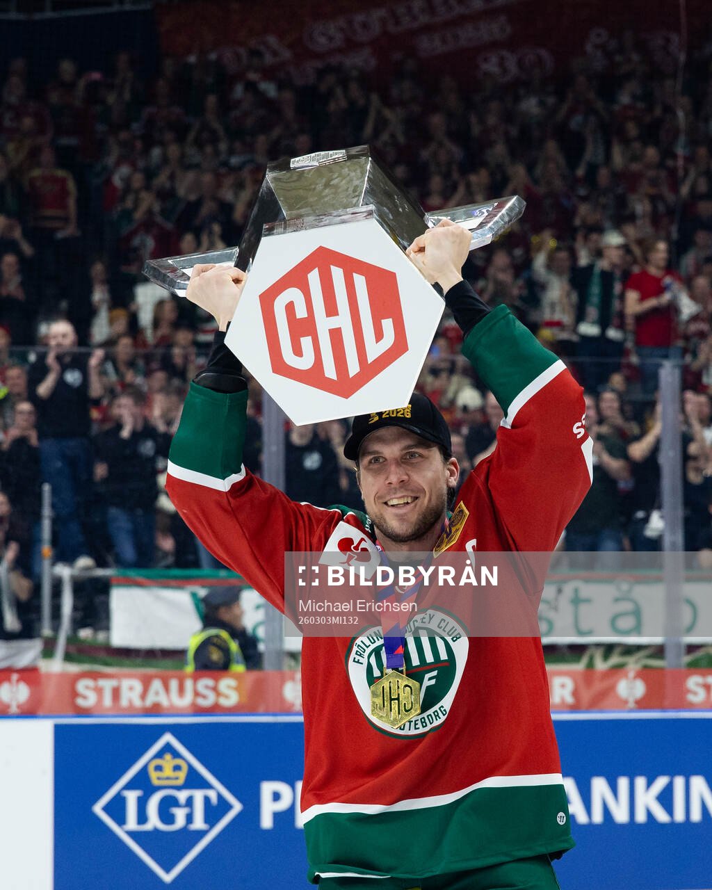 Henrik Tömmernes of Frölunda celebrates with the trophy