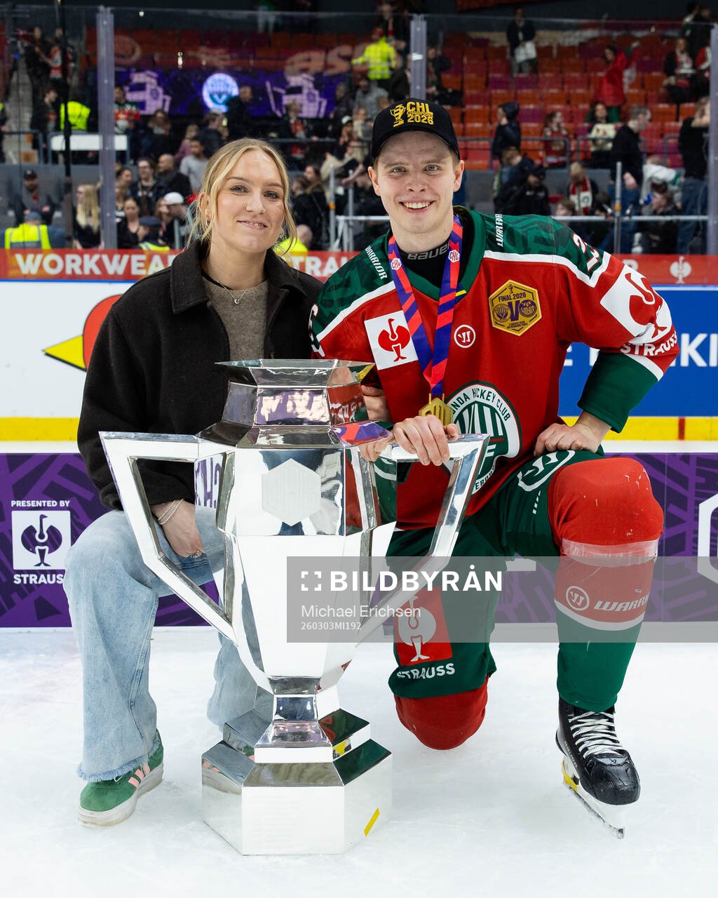 Isac Heens of Frölunda and his fiancée celebrate with the
