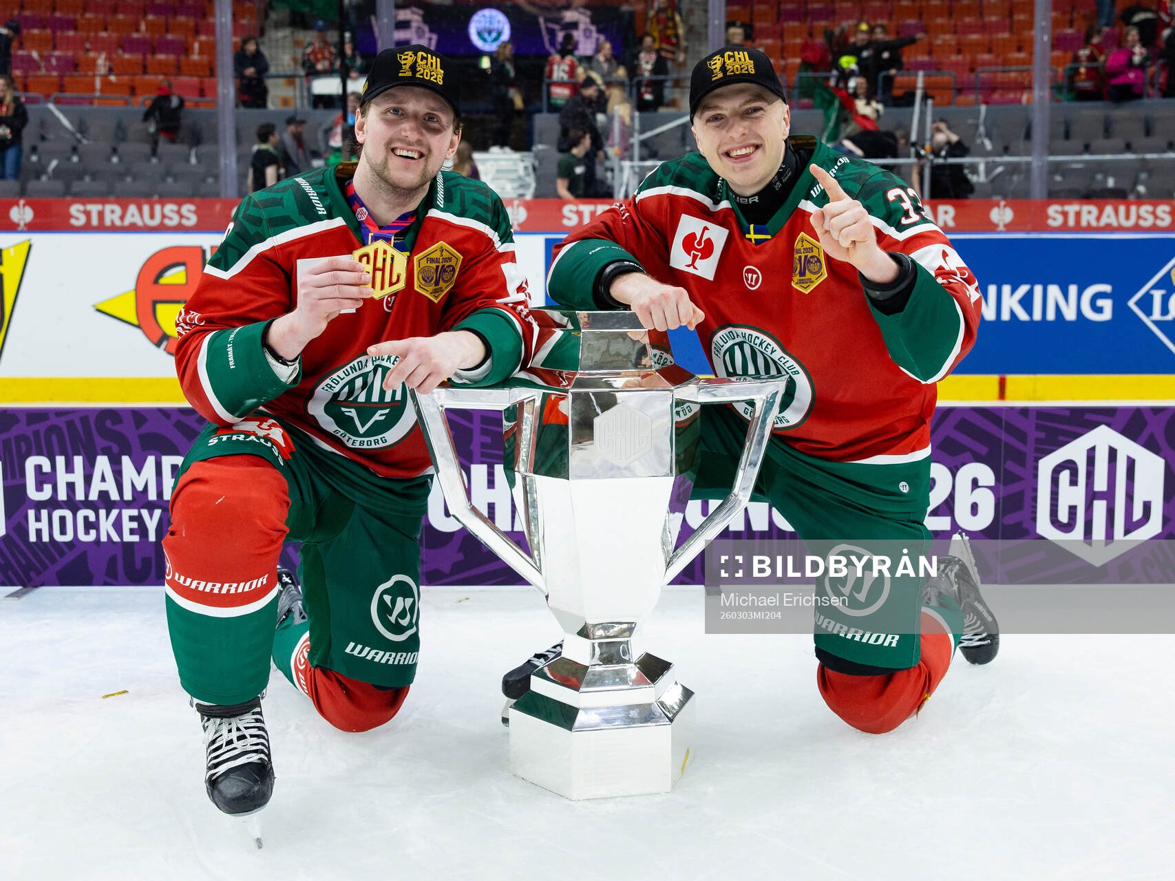Linus Weissbach and Linus Högberg of Frölunda  celebrate