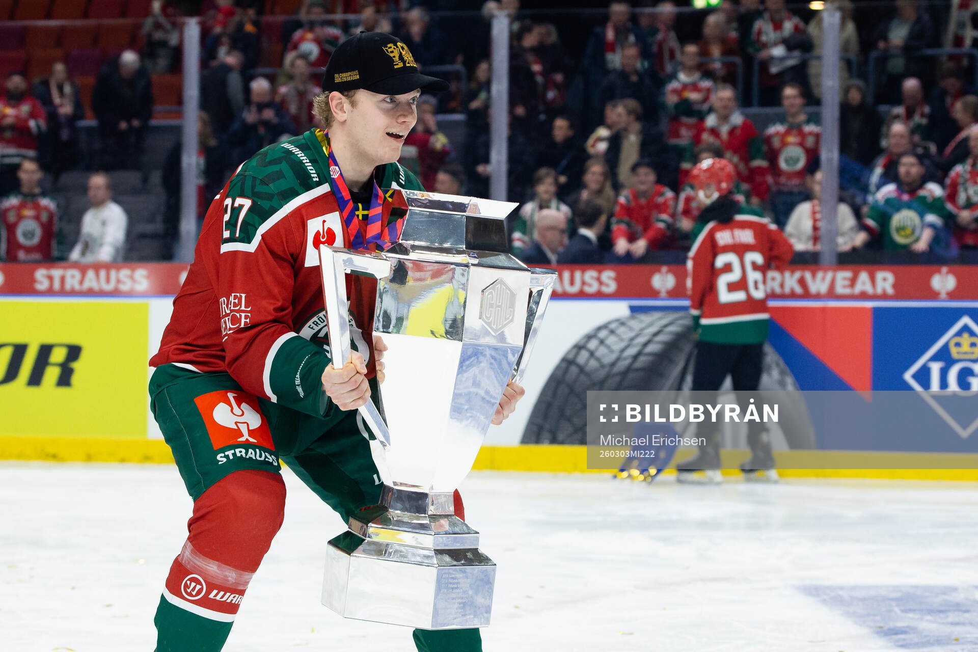 Theodor Niederbach of Frölunda celebrates with the trophy