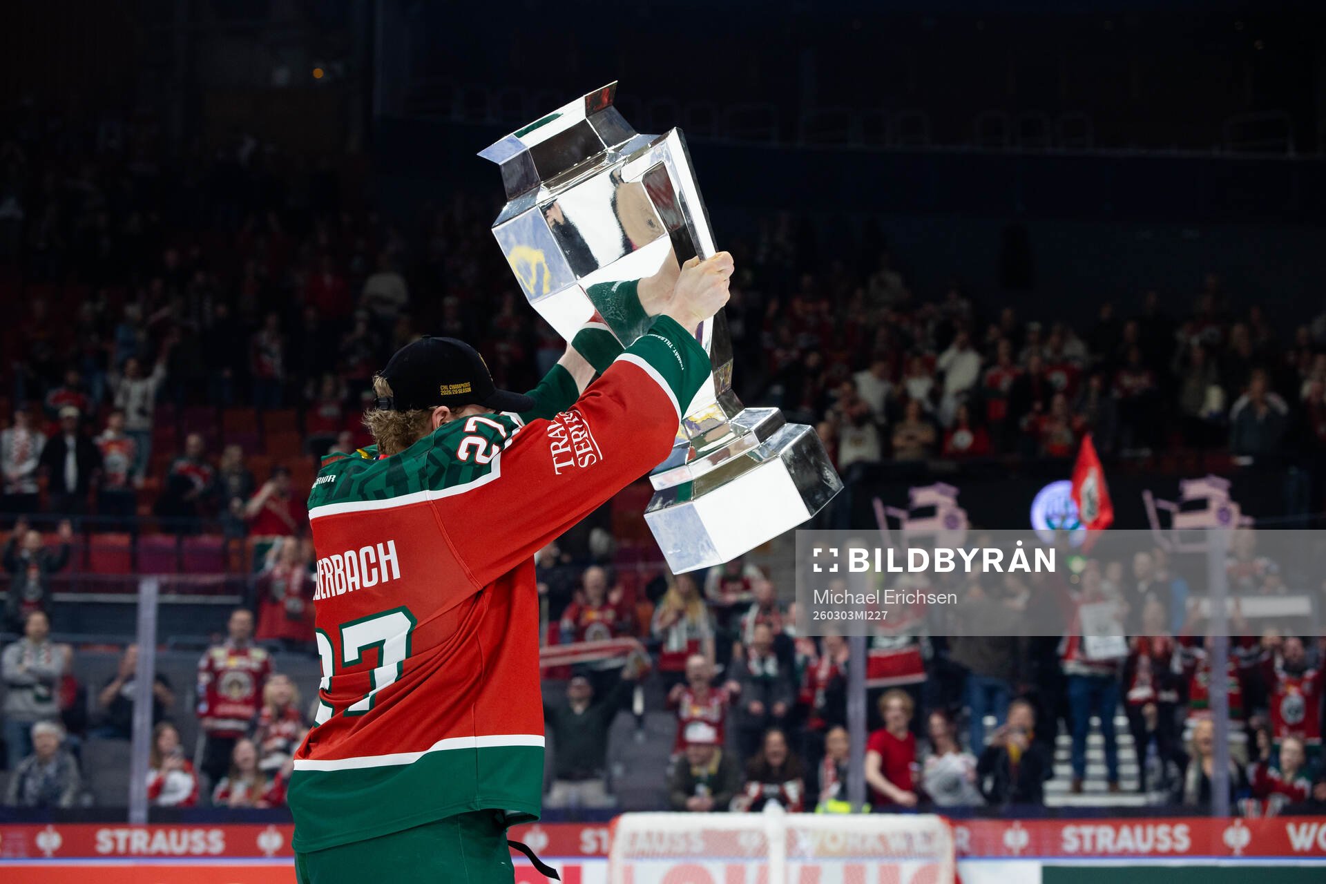 Theodor Niederbach of Frölunda celebrates with the trophy