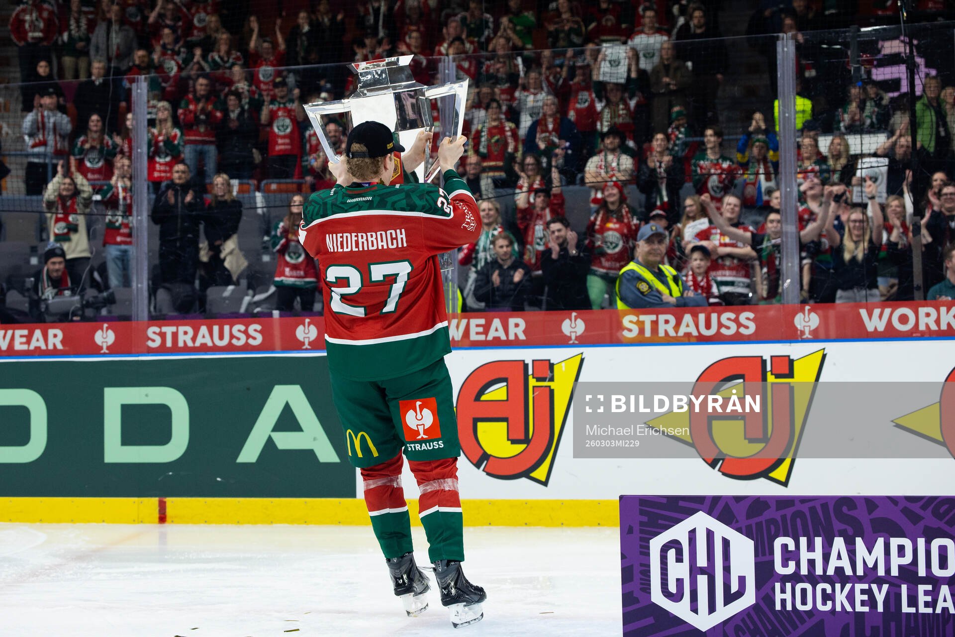 Theodor Niederbach of Frölunda celebrates with the trophy