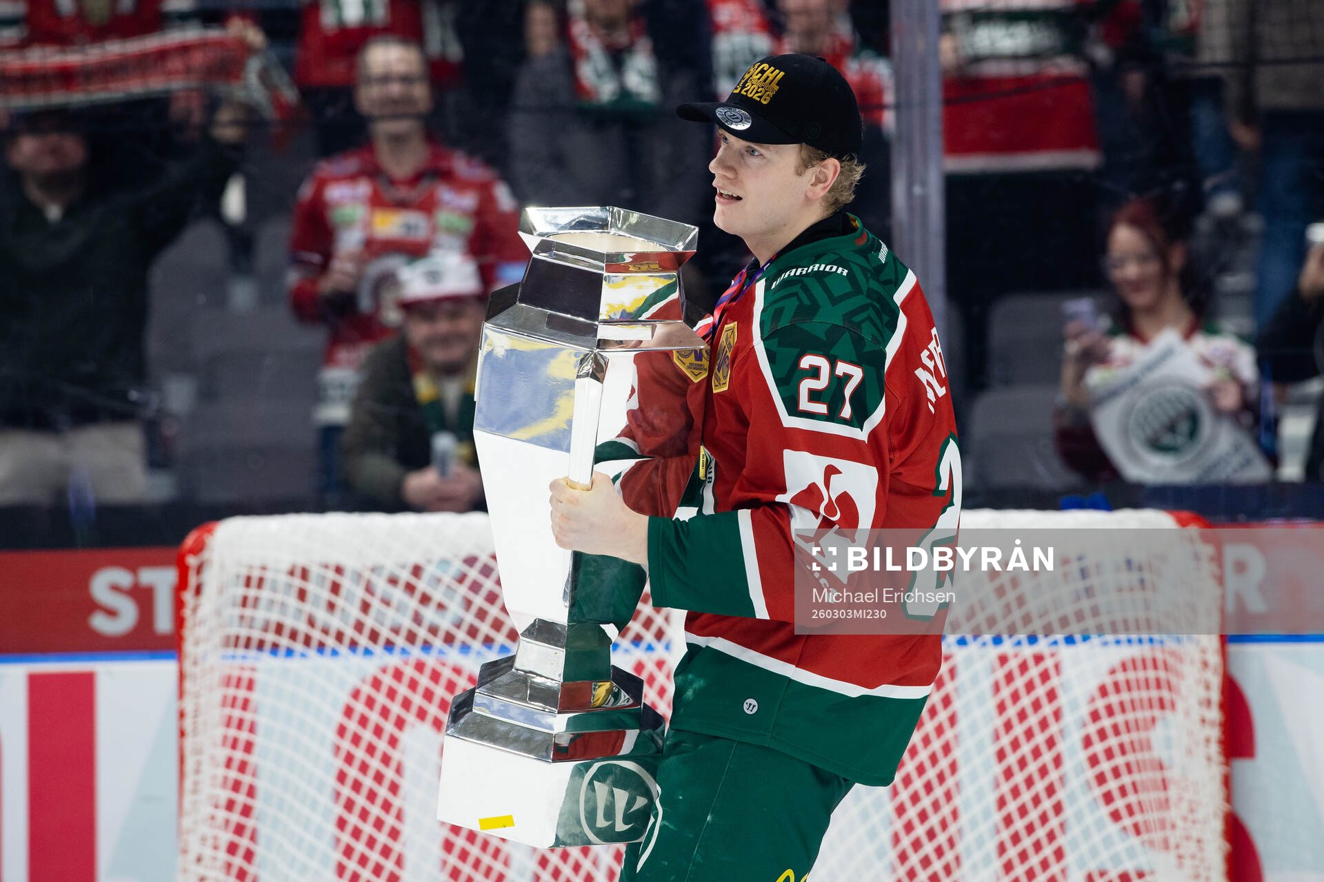 Theodor Niederbach of Frölunda celebrates with the trophy