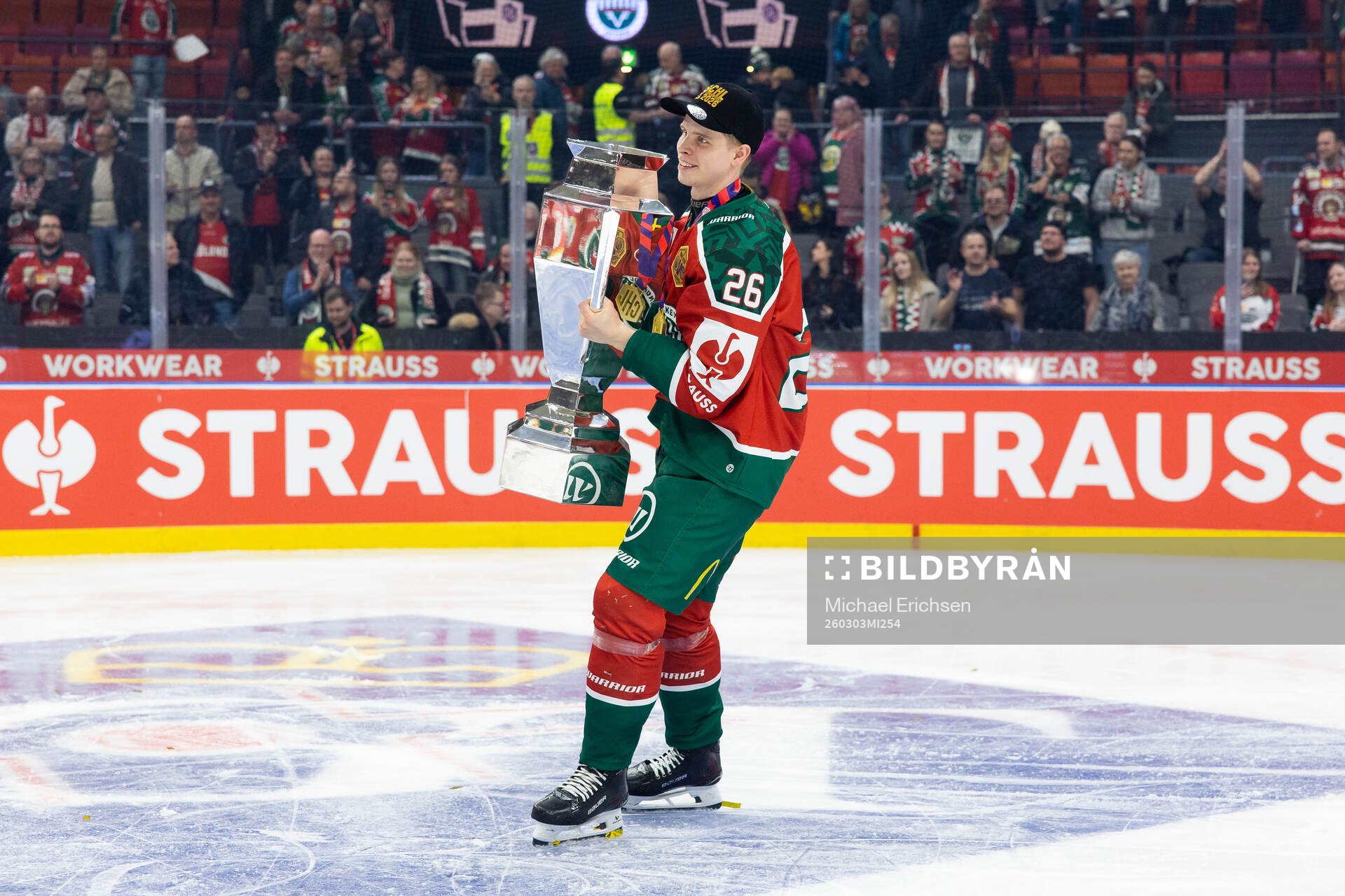 Isac Heens of Frölunda celebrates with the trophy