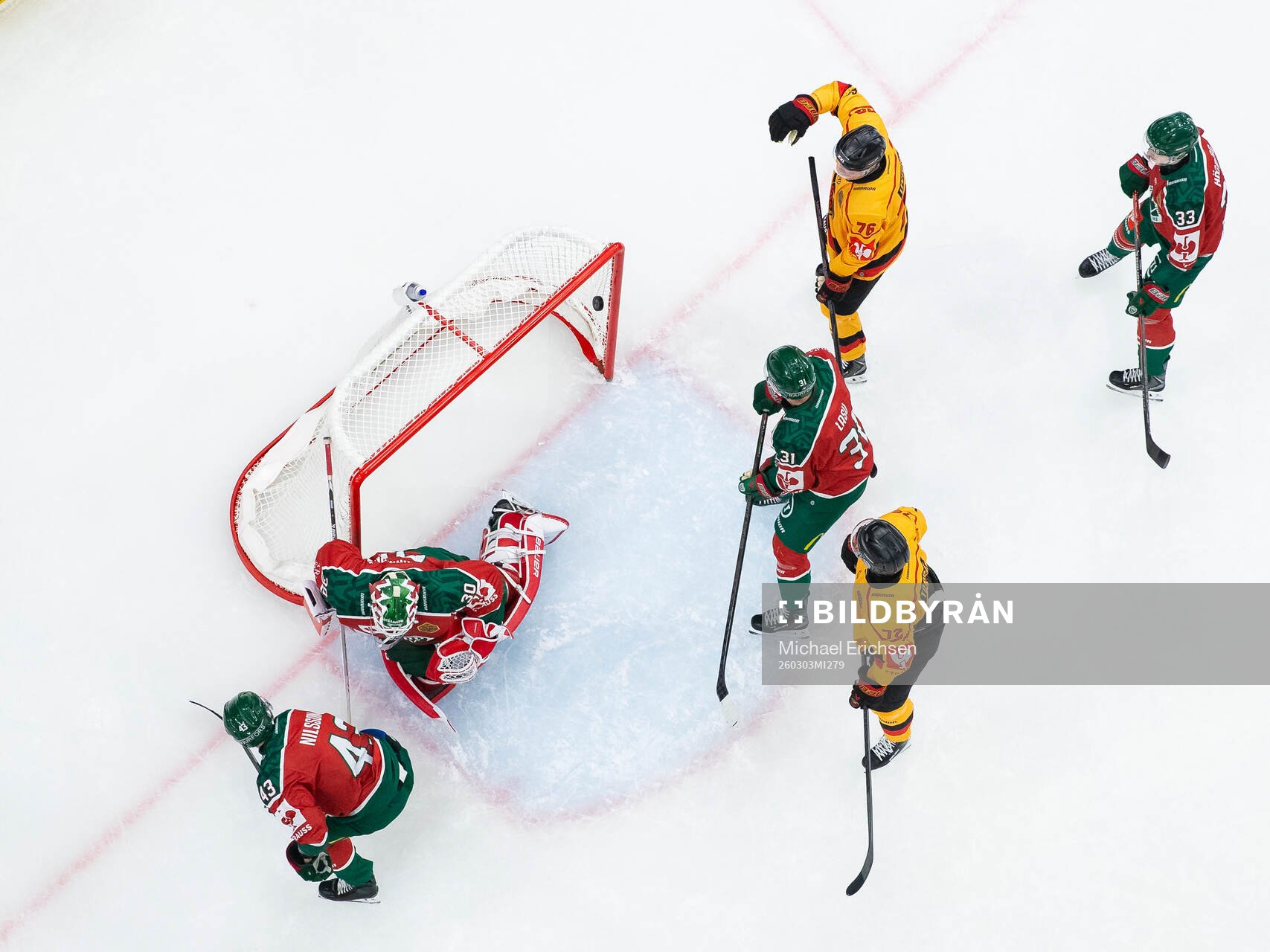 Otto Leskinen of Luleå scores 2-2 behind goaltender Tobias