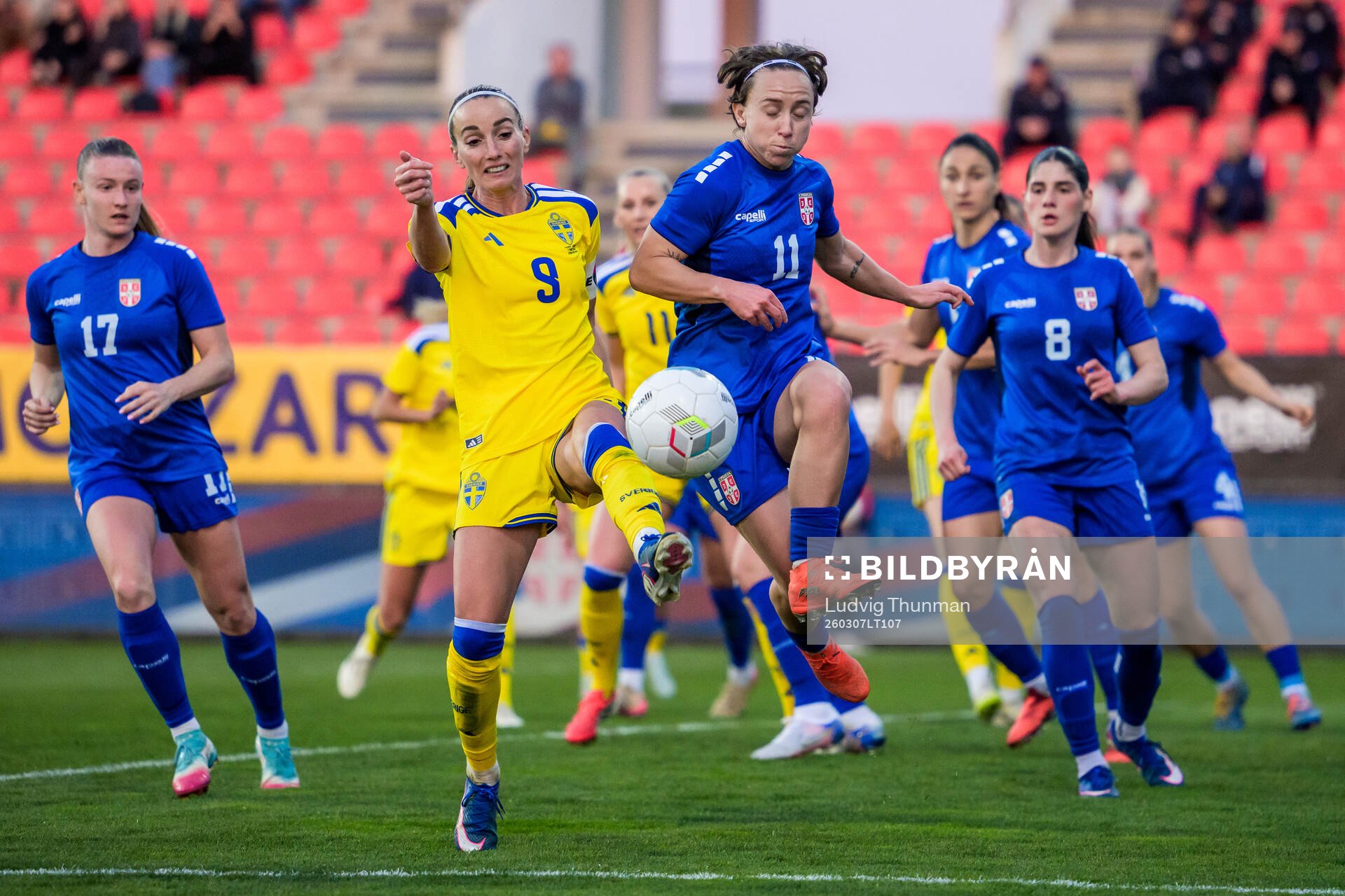 Kosovare Asllani of Sweden and Miljana Ivanovic of Serbia