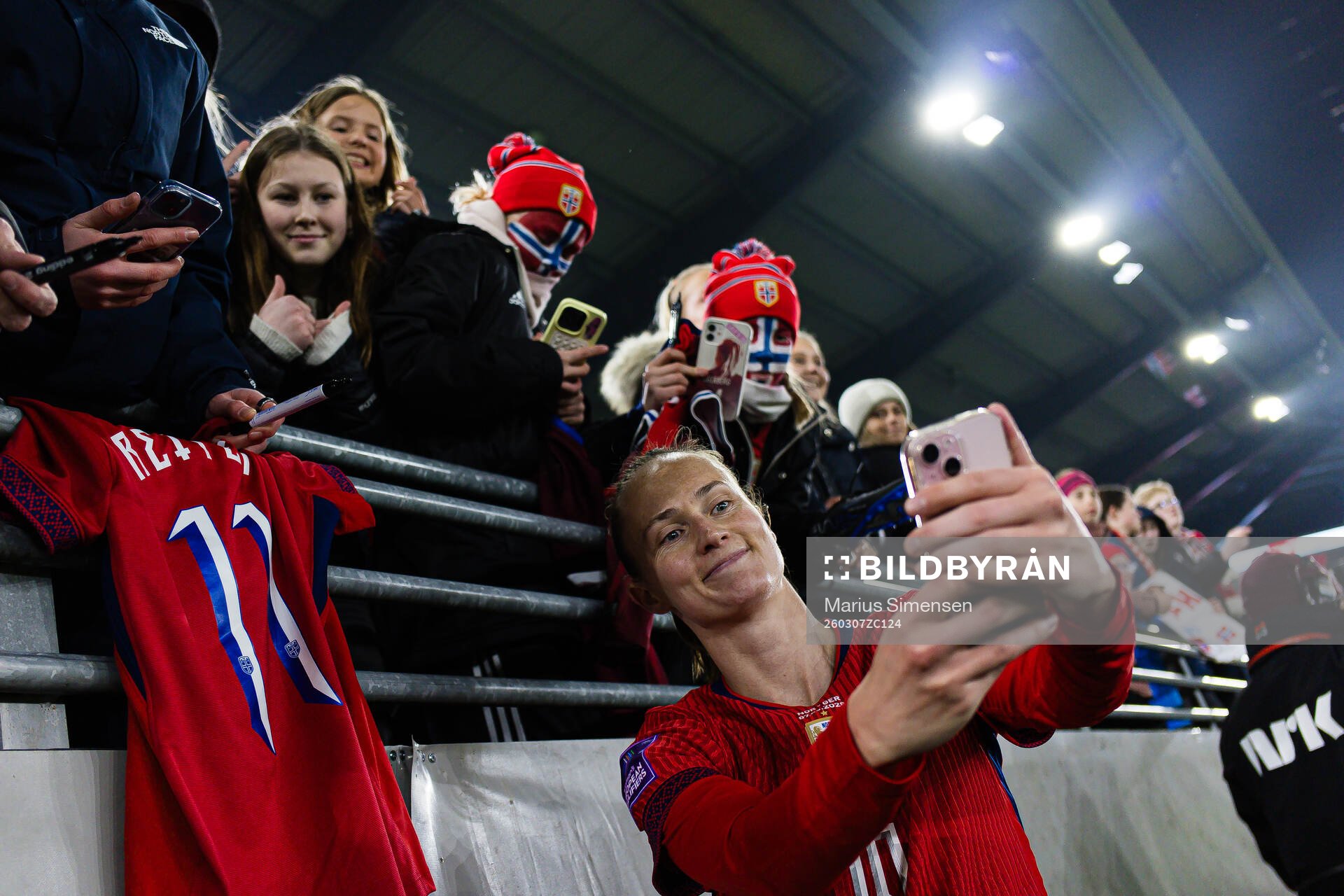 Caroline Graham Hansen of Norway taking a selfie with a fan