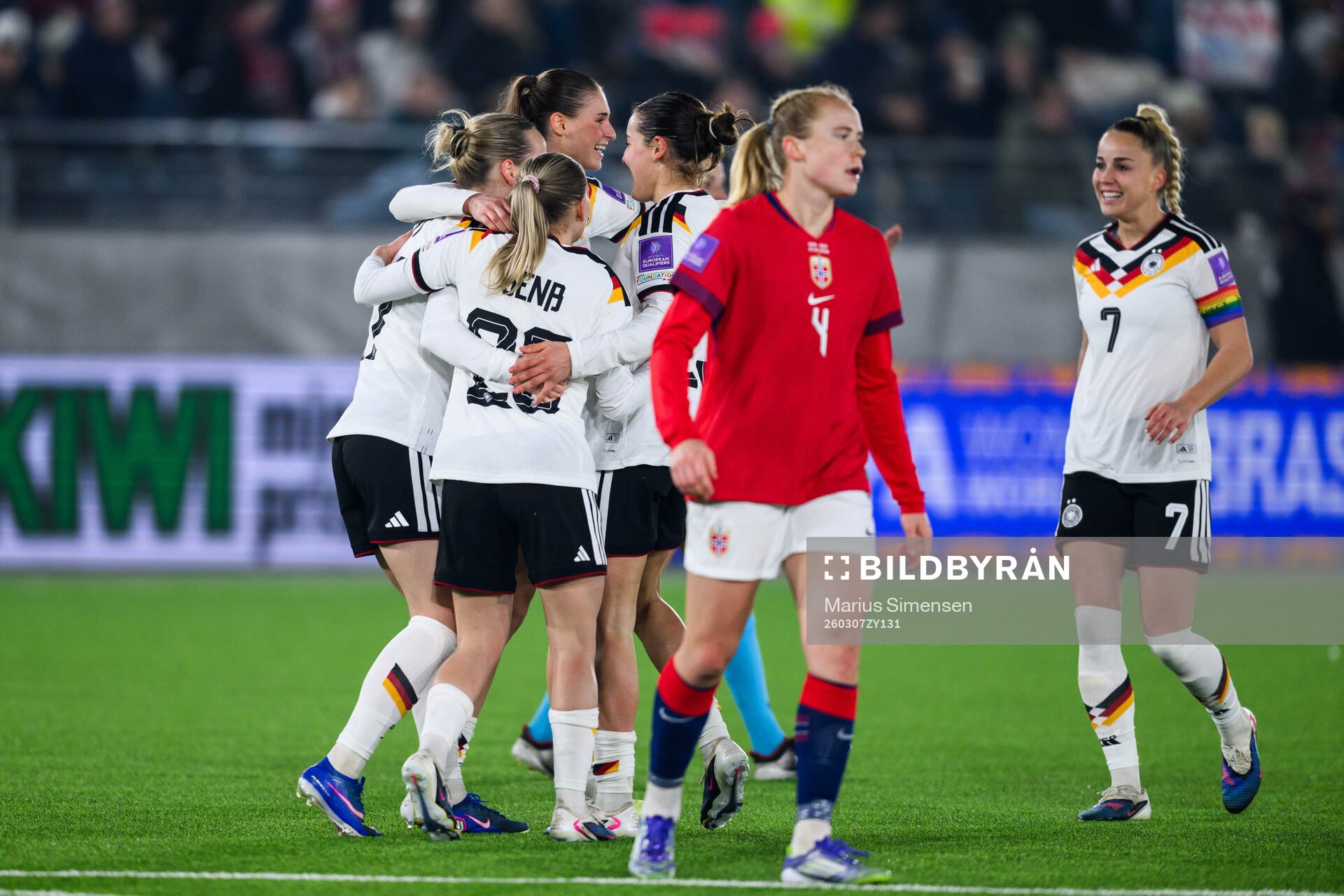 Jule Brand of Germany celebrate with teammates