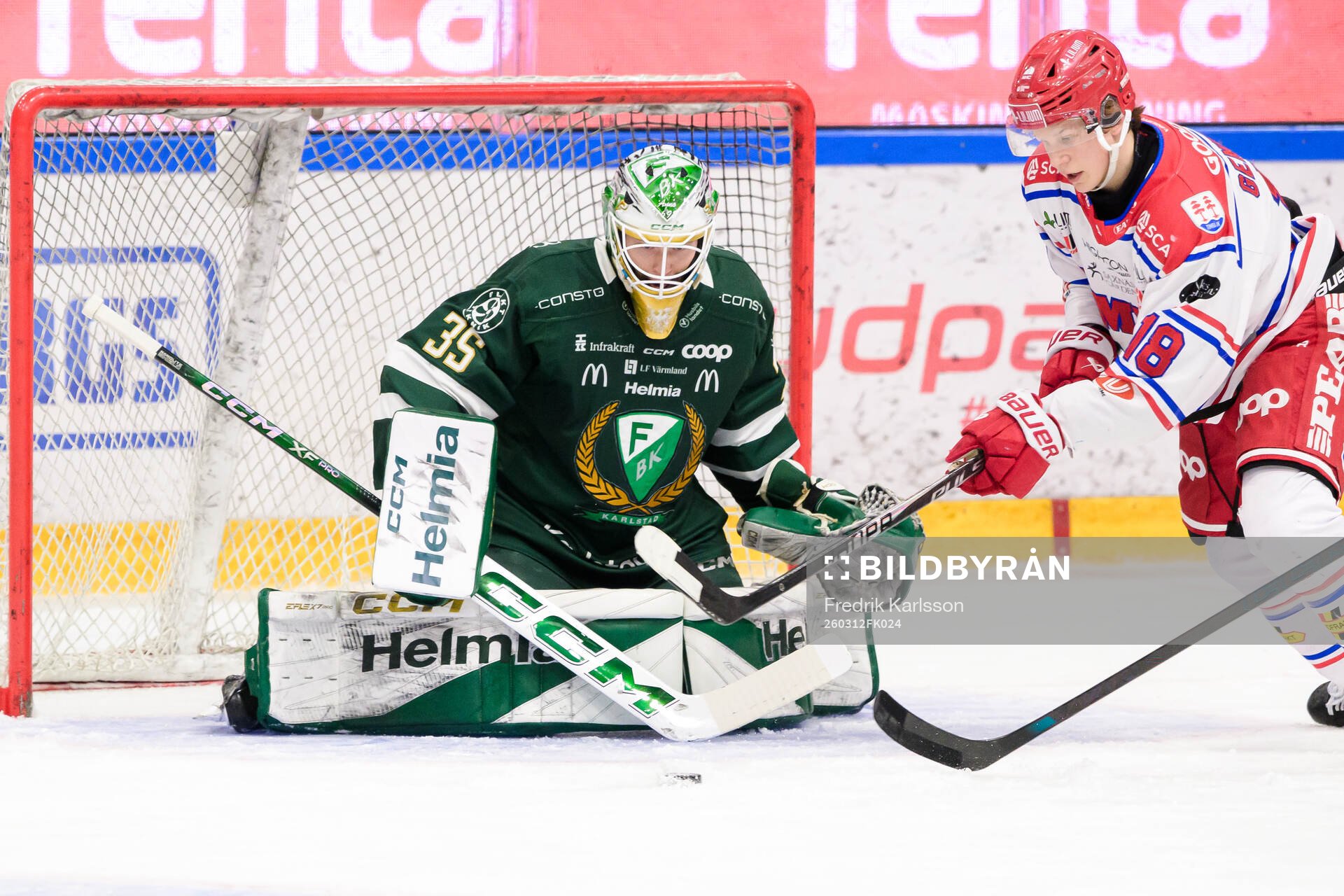 Färjestads målvakt Melker Thelin och Timrås Eddie Genborg