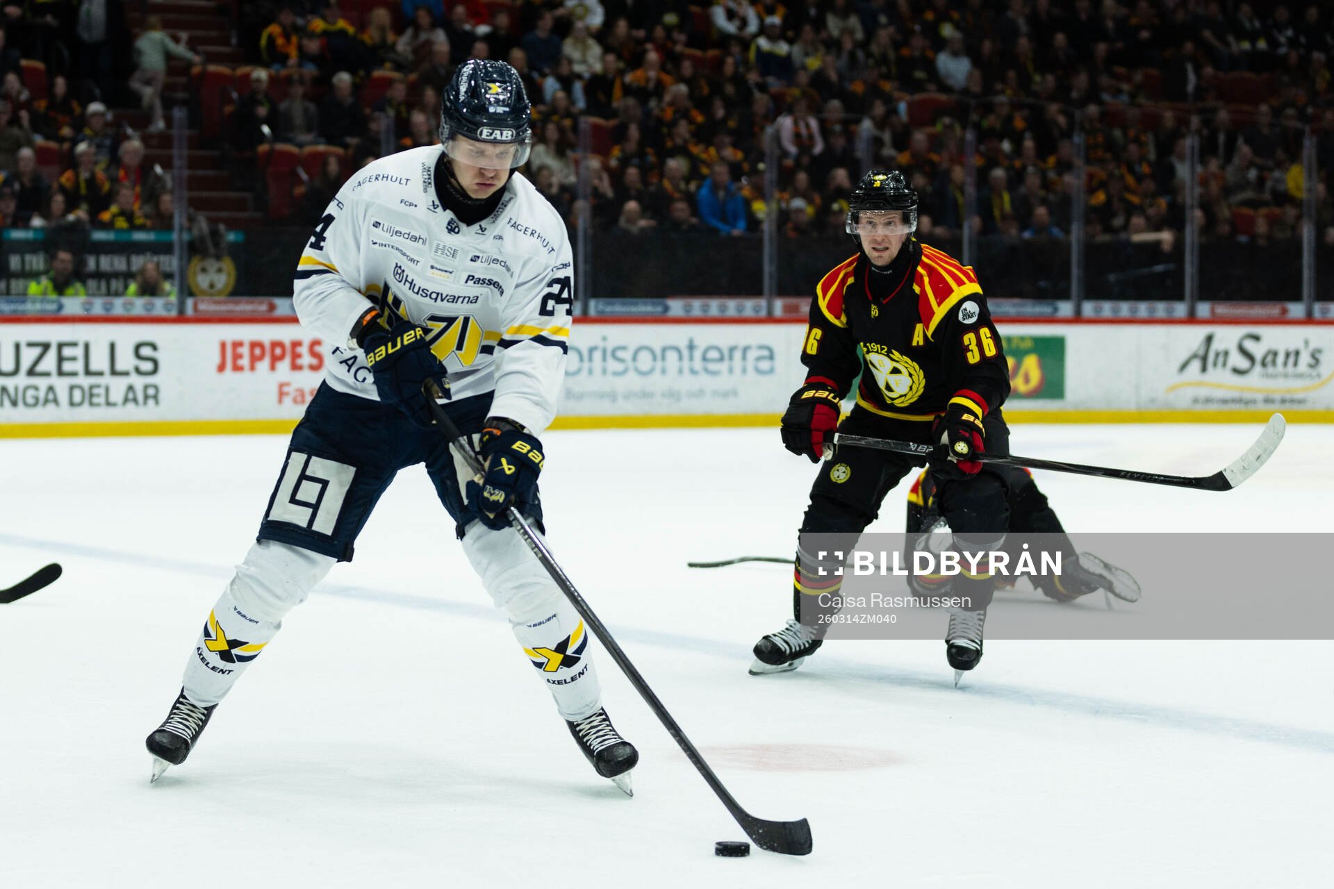 HV71s Hampus Eriksson och Brynäs Linus Ölund