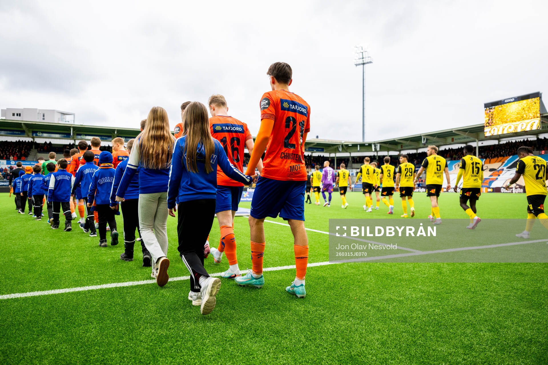 Players of Aalesund and Lillestrøm enter the pitch