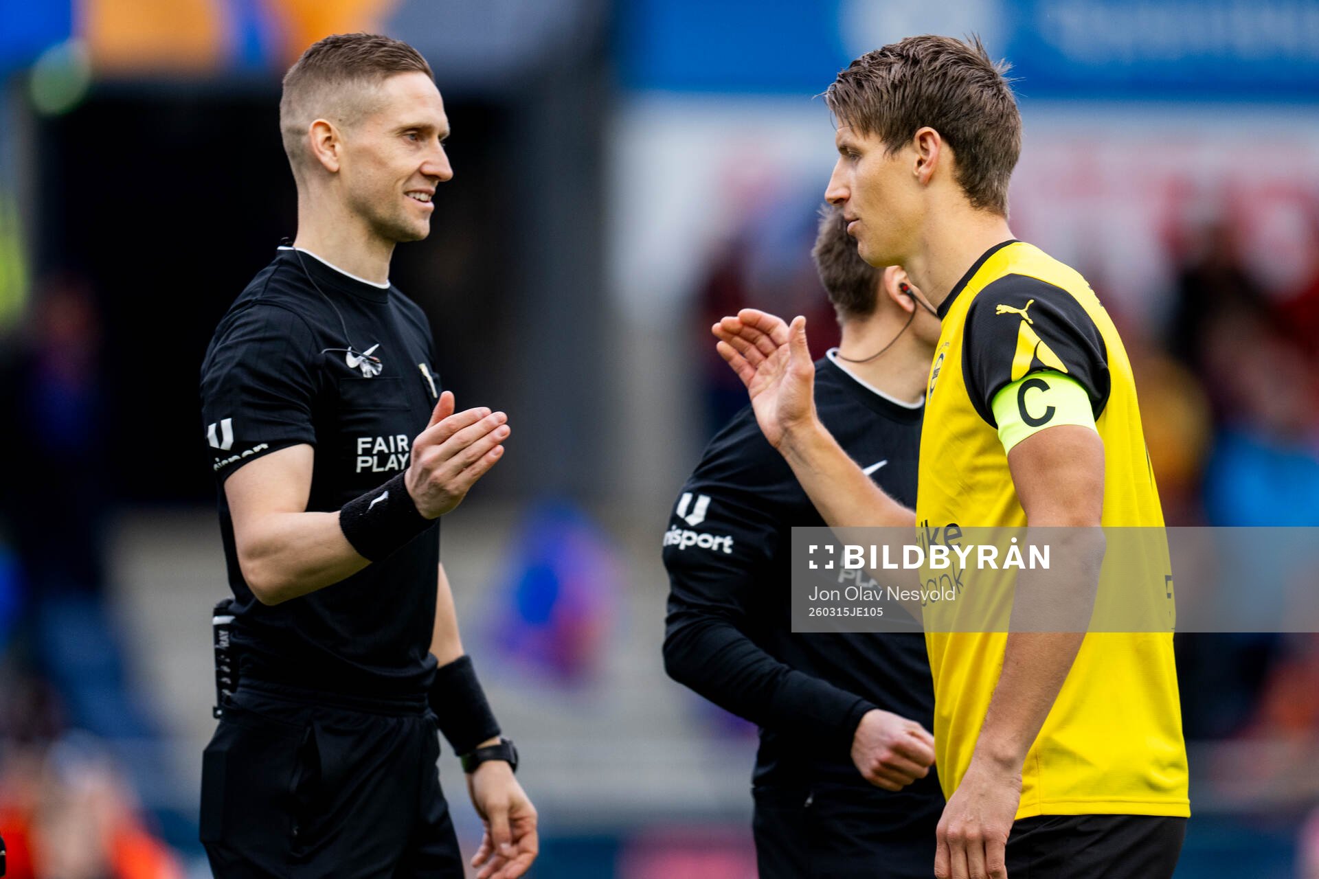 Referee Espen Eskås and Thomas Lehne Olsen of Lillestrøm