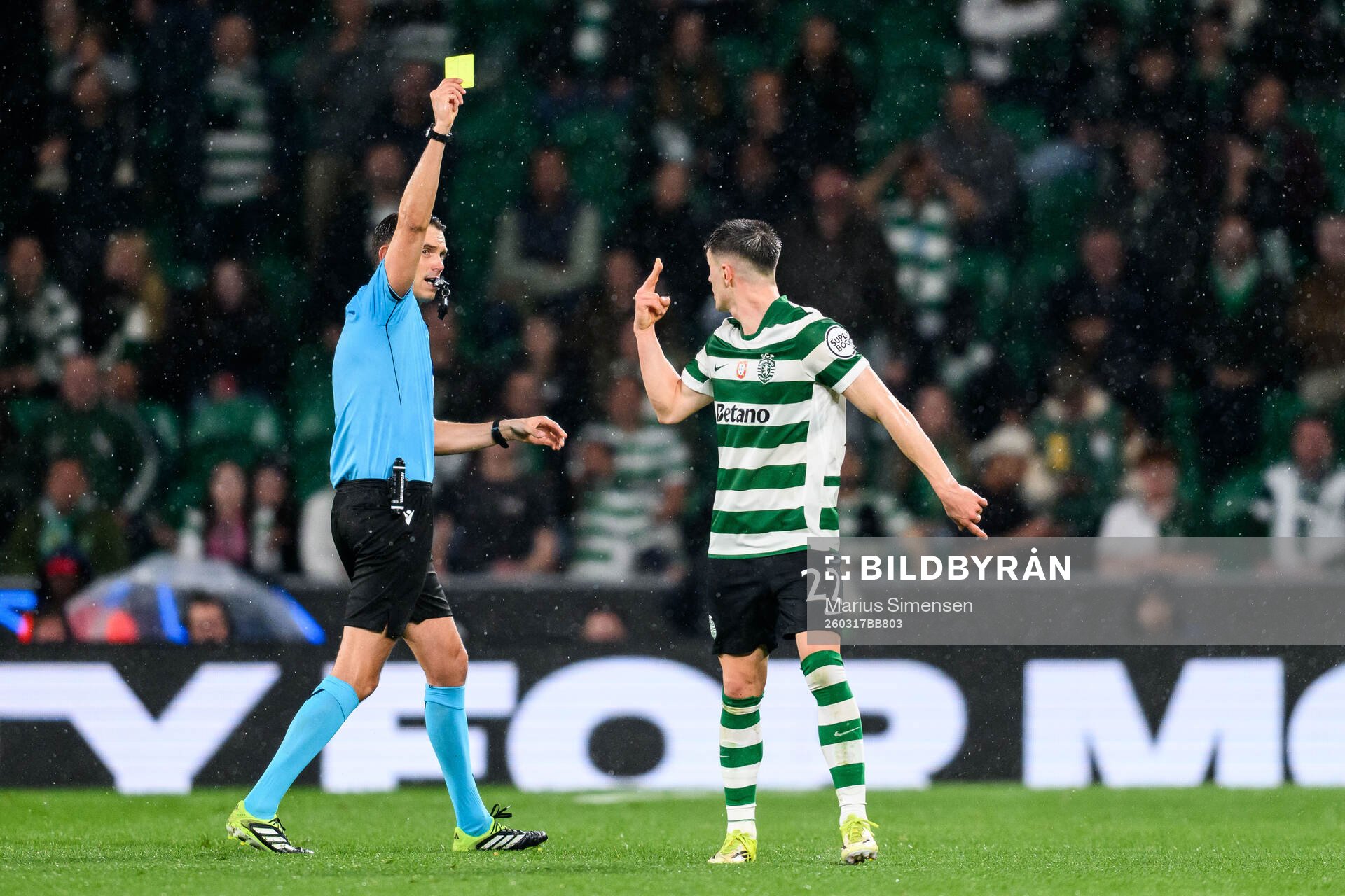 Sandro Schärer, referee shows a yellow card for Iván