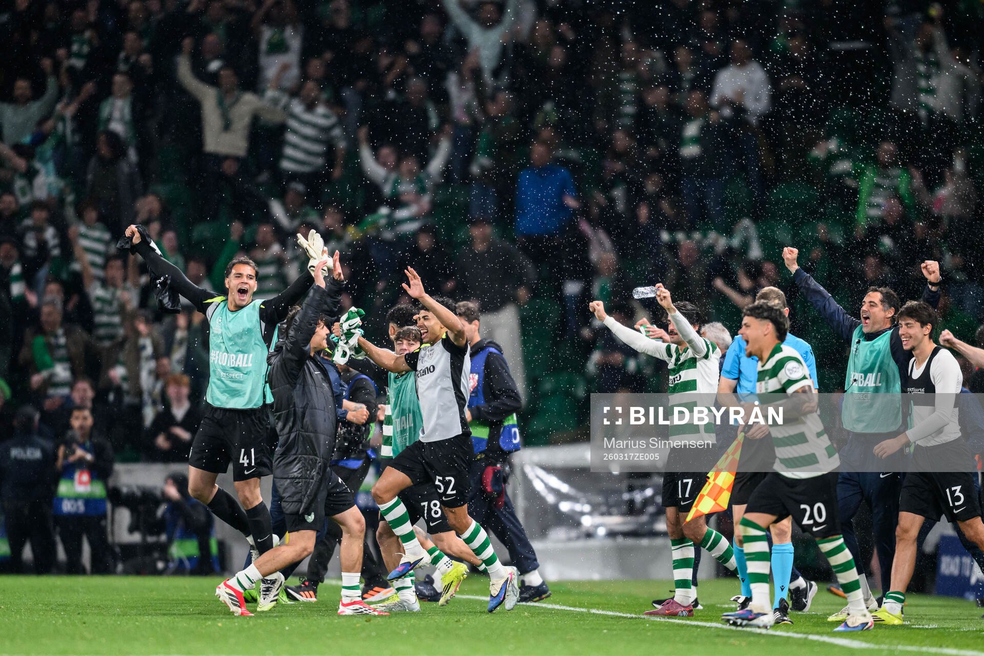Players of Sporting celebrate