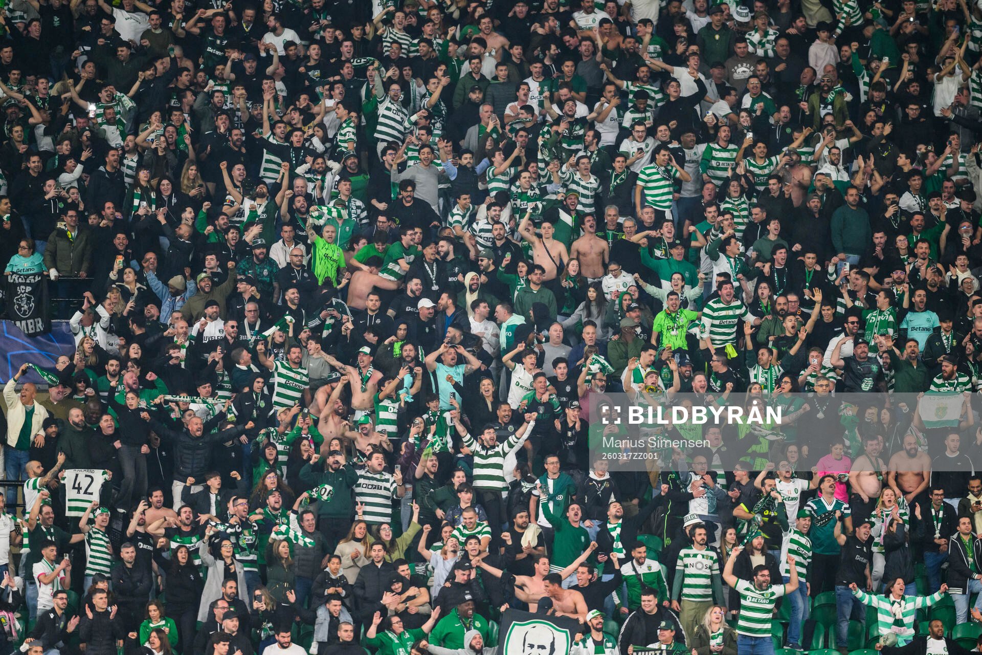 Fans of Sporting celebrate