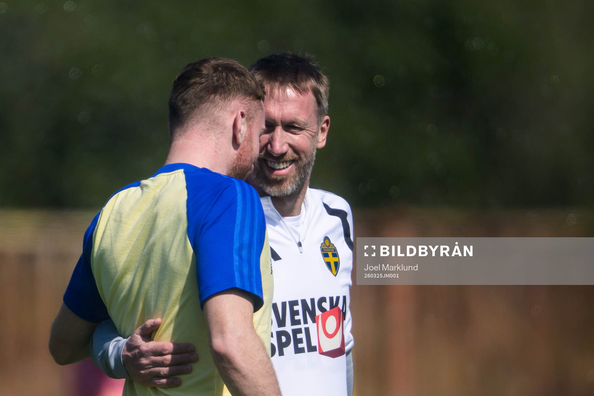 Injured player Dejan Kulusevski gets a hug from head coach
