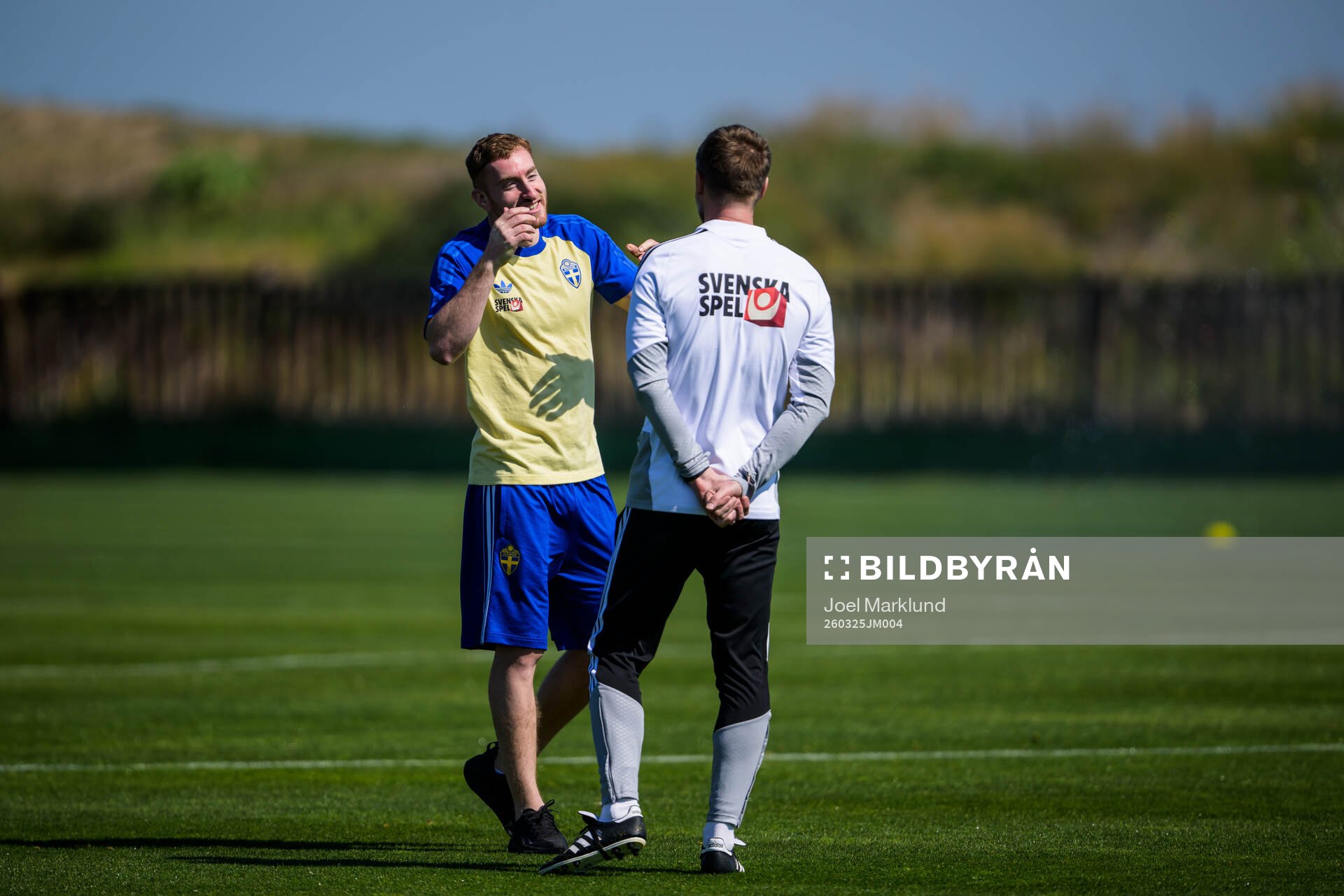 Injured player Dejan Kulusevski and head coach Graham