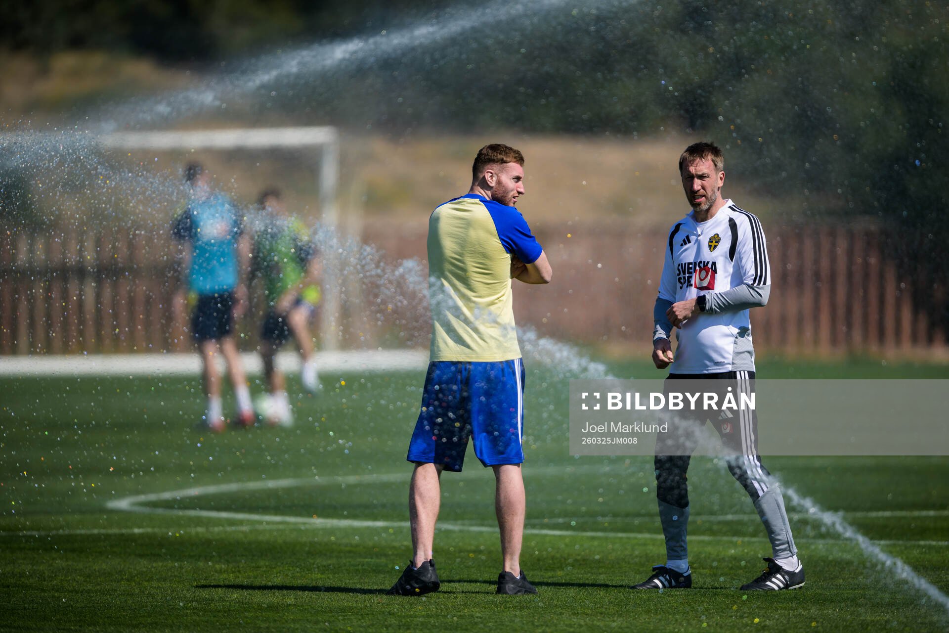 Injured player Dejan Kulusevski and head coach Graham