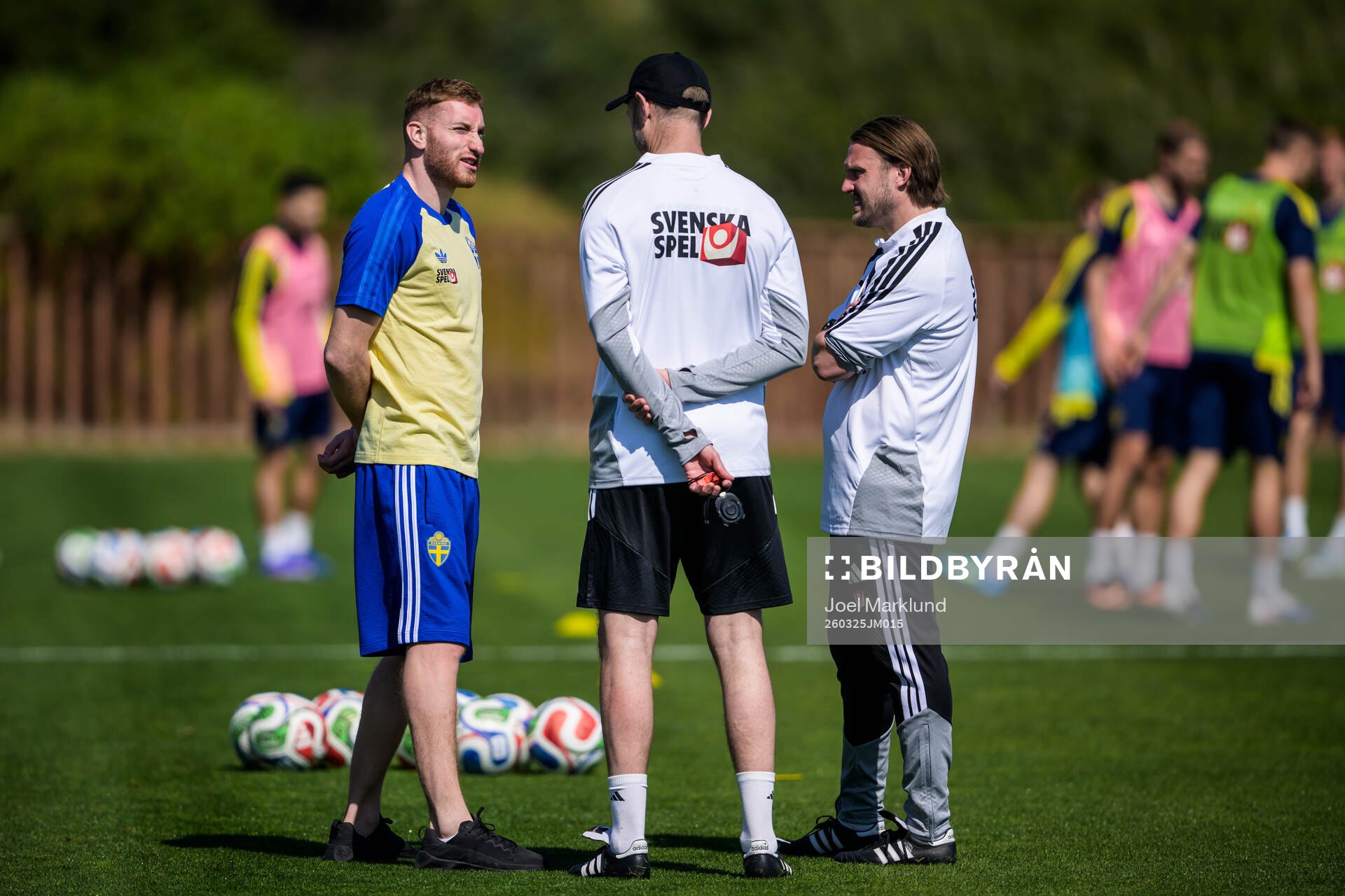 Injured player Dejan Kulusevski and assistant coaches