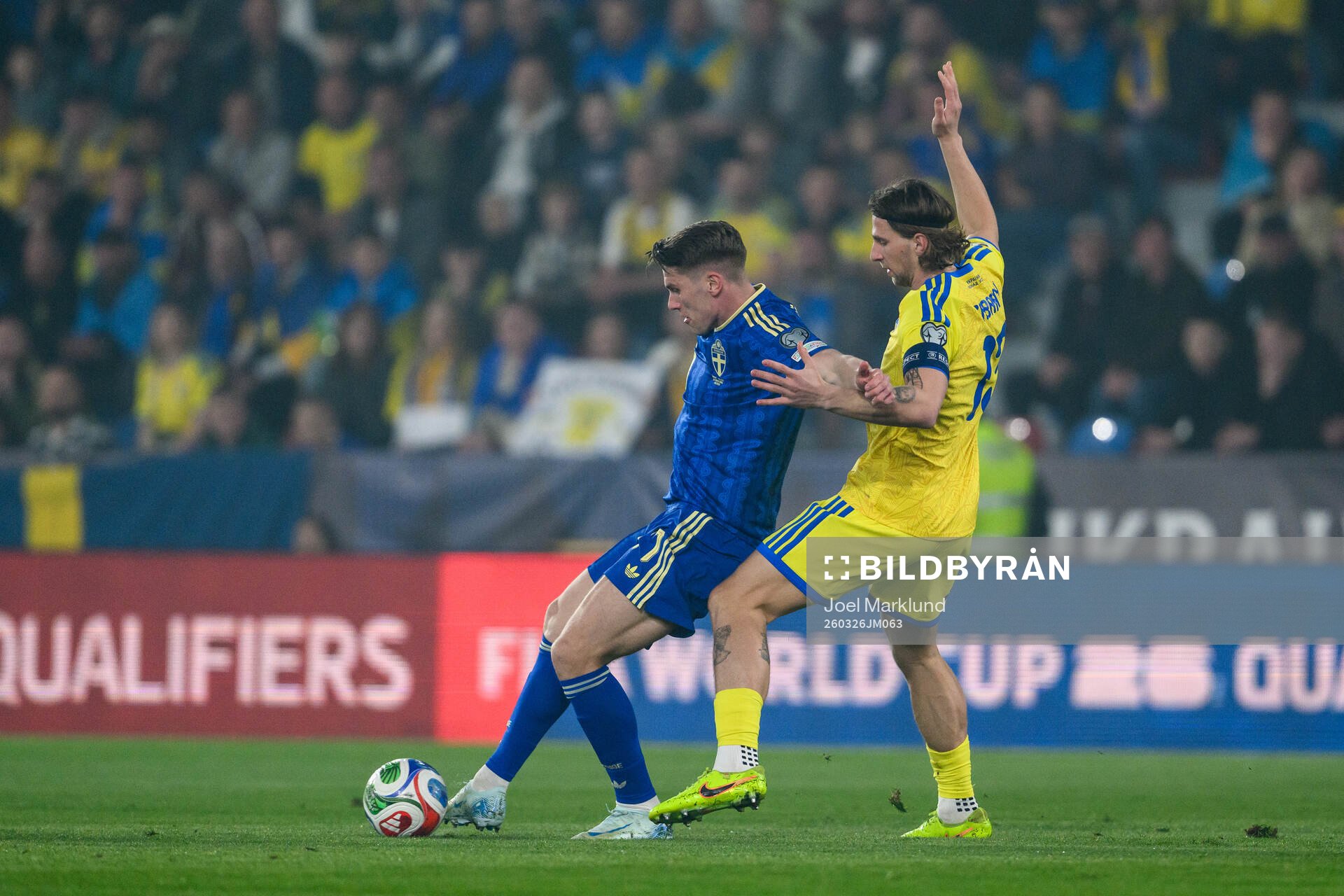Viktor Gyökeres of Sweden and Illia Zabarnyi of Ukraine