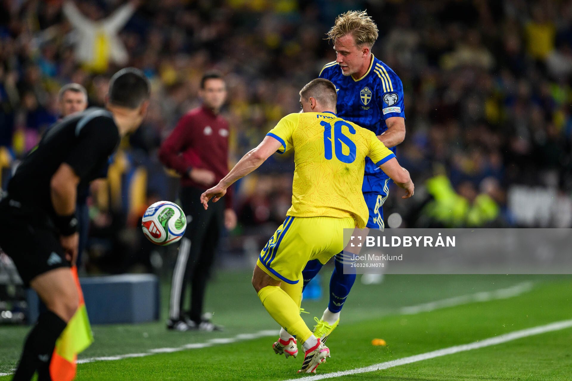 Vitaliy Mykolenko of Ukraine and Herman Johansson of Sweden