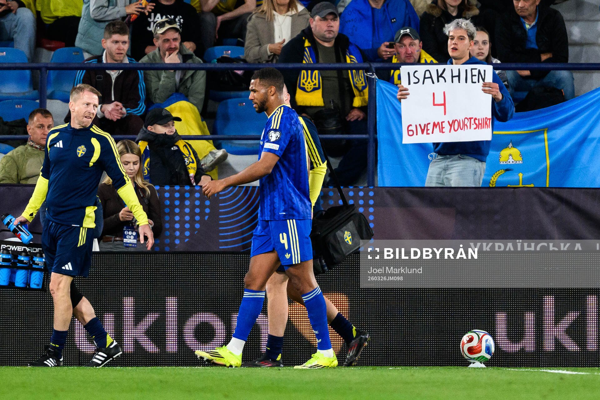 Isak Hien of Sweden leaves the pitch with an injury