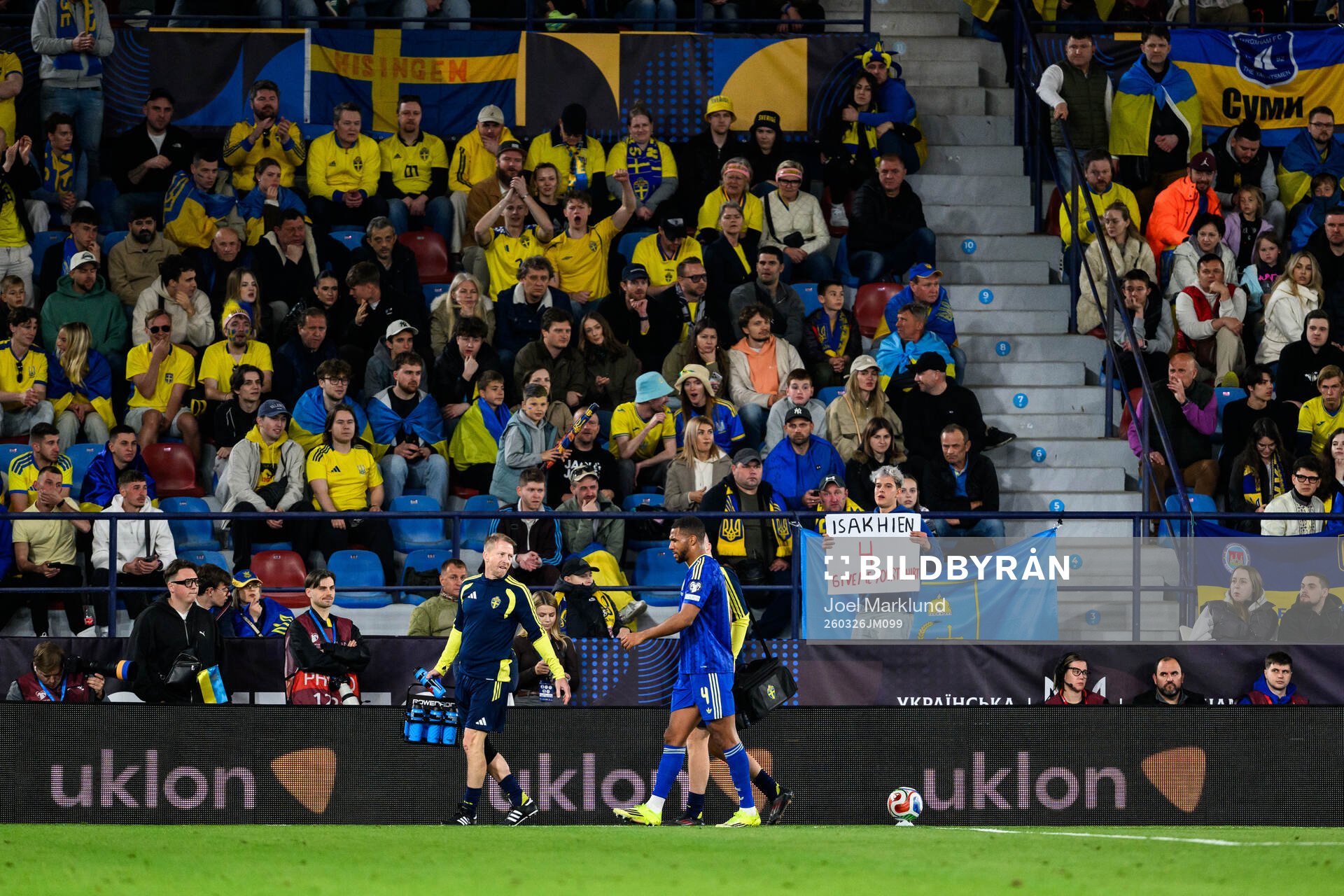 Isak Hien of Sweden leaves the pitch with an injury