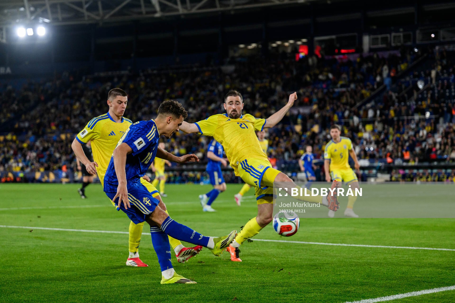 Yasin Ayari of Sweden against Vitaliy Mykolenko and Ivan