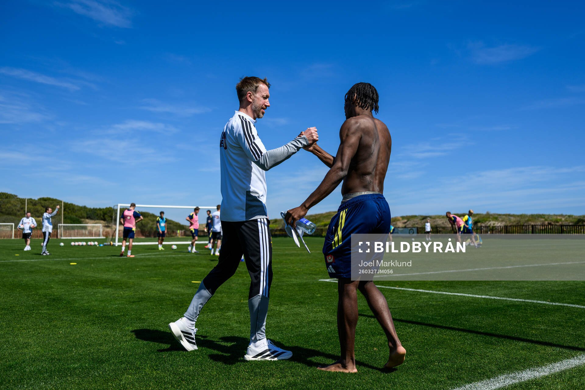 Head coach Graham Potter and Anthony Elanga of the Swedish