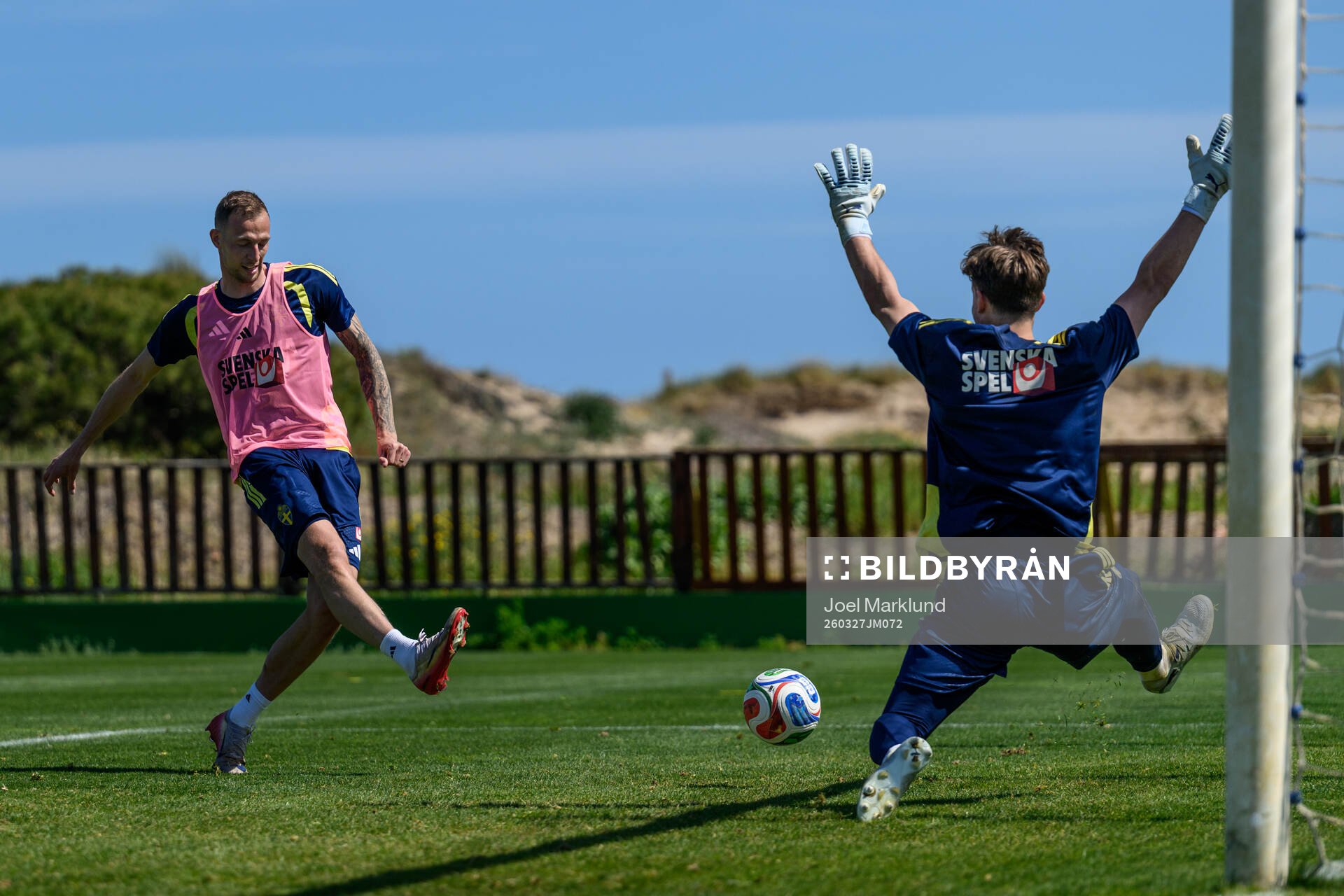 Gustaf Nilsson and goalkeeper Melker Ellborg of the Swedish