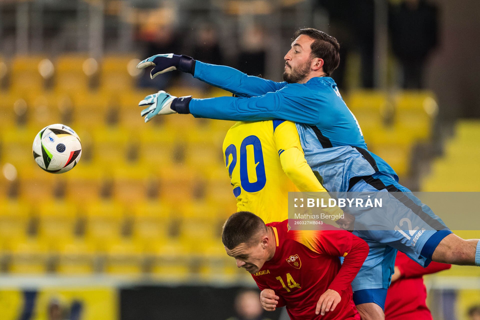 Richie Omorowa of Sweden and Velimir Ljutica and Goalkeeper