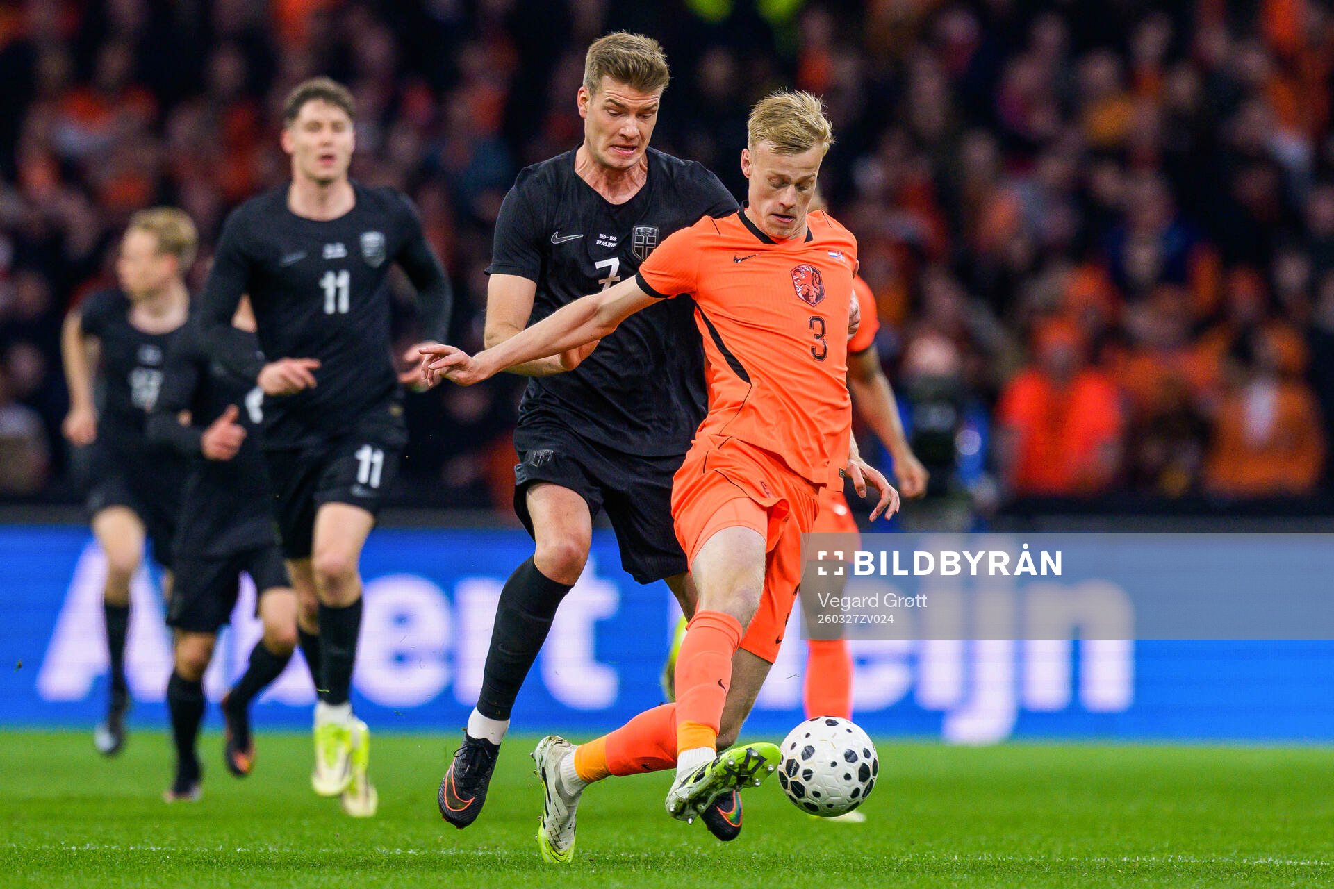 Alexander Sørloth of Norway and Jan Paul van Hecke of
