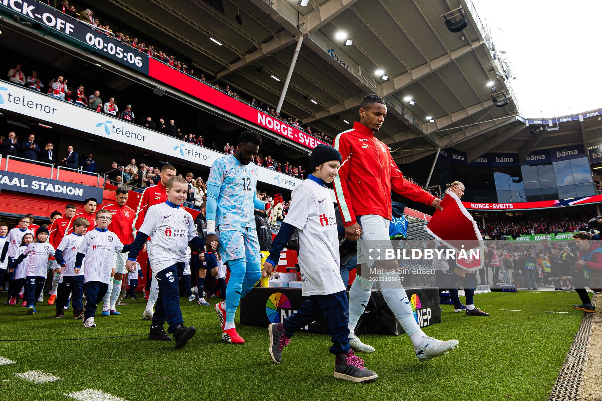 Goalkeeper Yvon Mvogo and Manuel Akanji of Switzerland