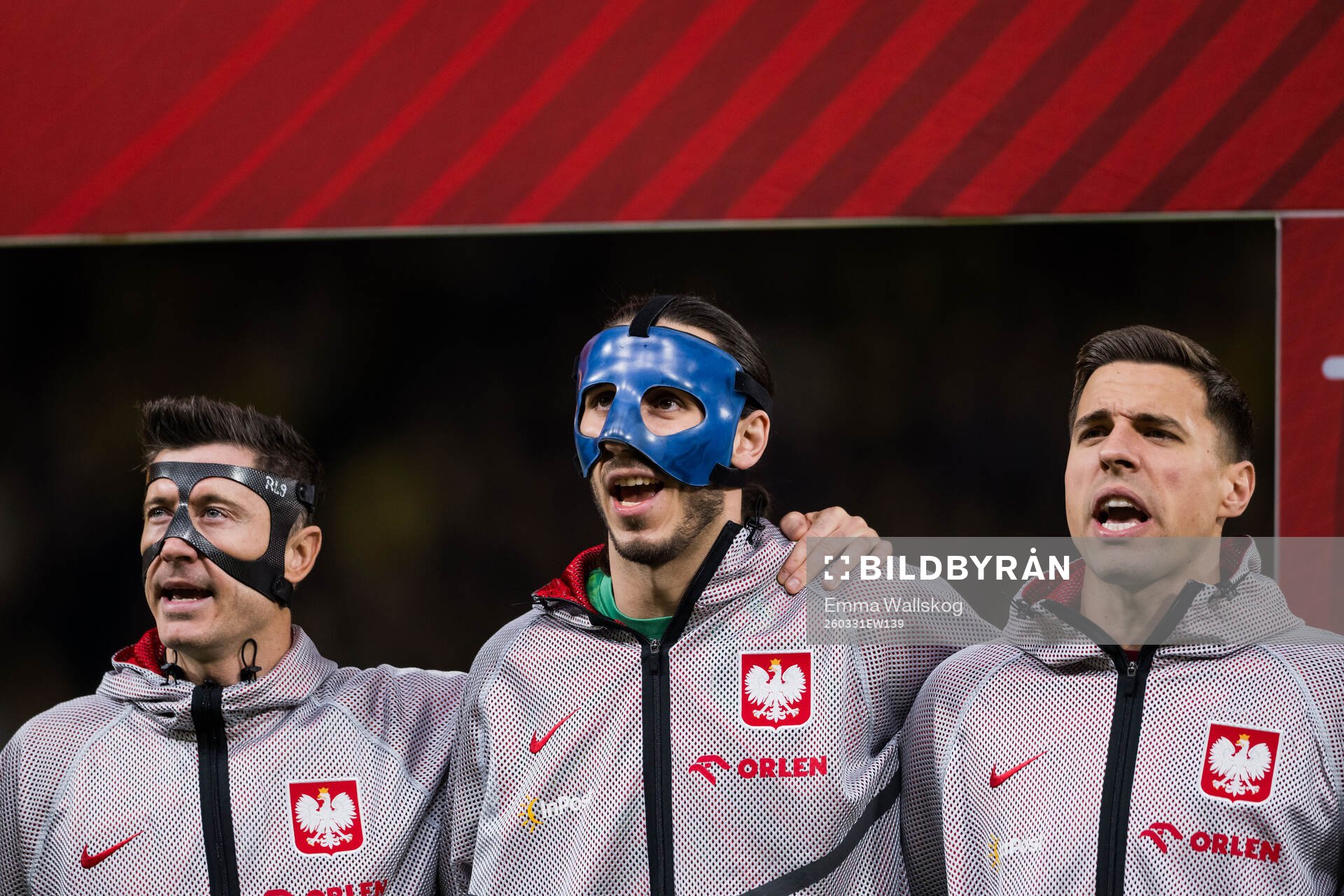 Robert Lewandowski, goalkeeper Kamil Grabara and Jan