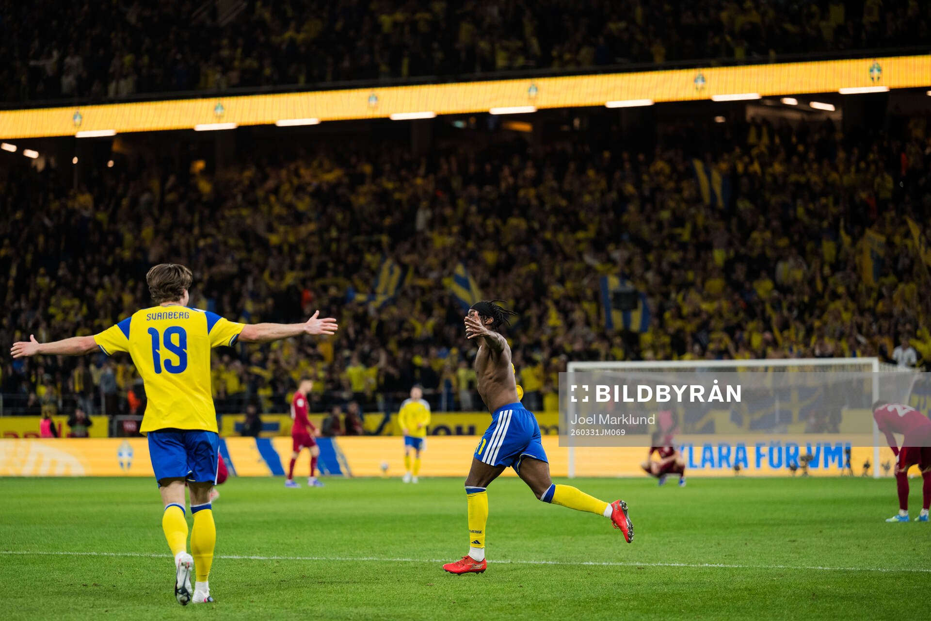 Mattias Svanberg and Anthony Elanga of Sweden celebrate