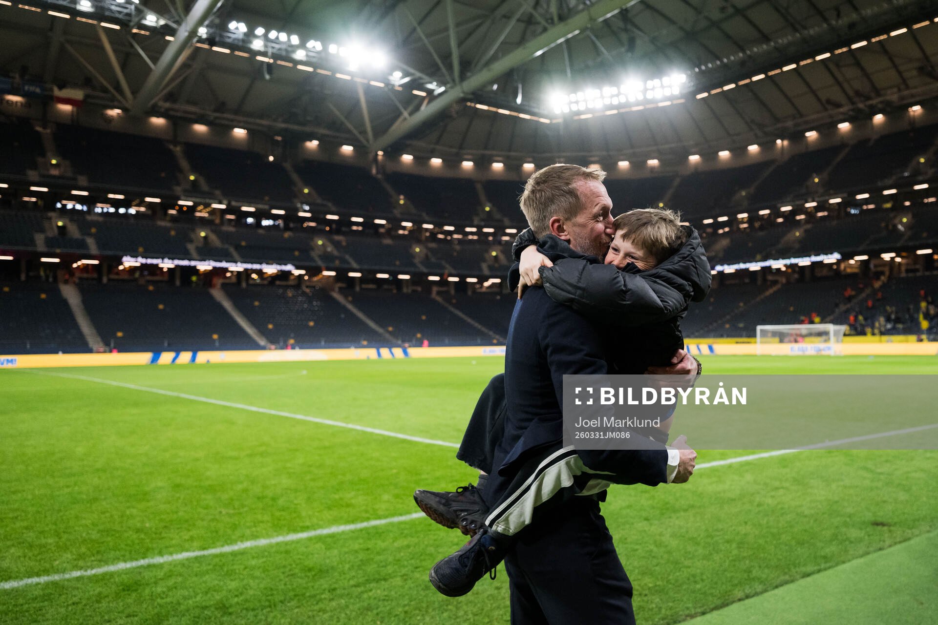 Head coach Graham Potter of Sweden celebrate with family