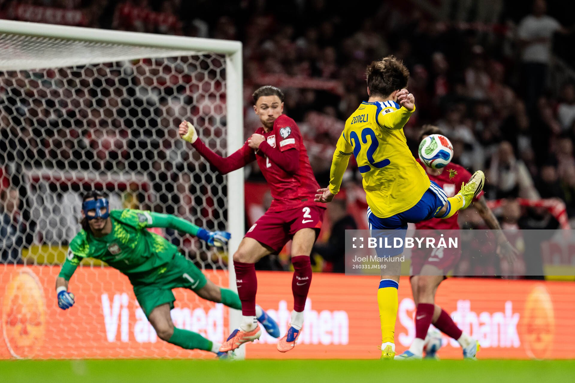 Besfort Zeneli of Sweden shoots the ball in the goal post