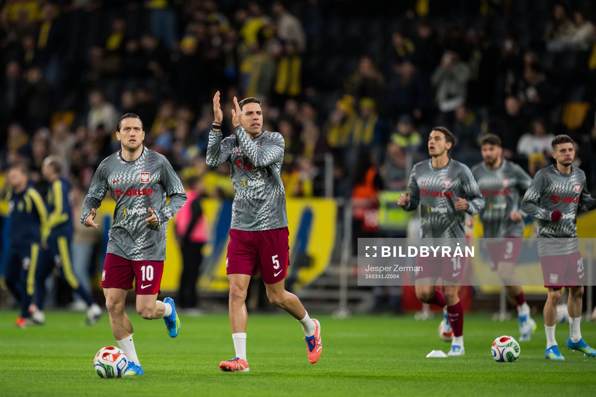 Piotr Zielinski and Jan Bednarek of Poland