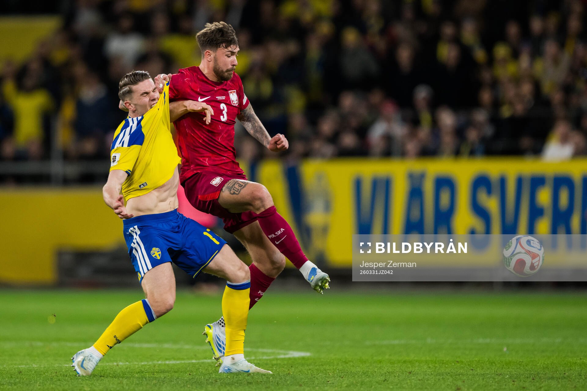 Viktor Gyökeres of Sweden and Przemyslaw Wisniewski of