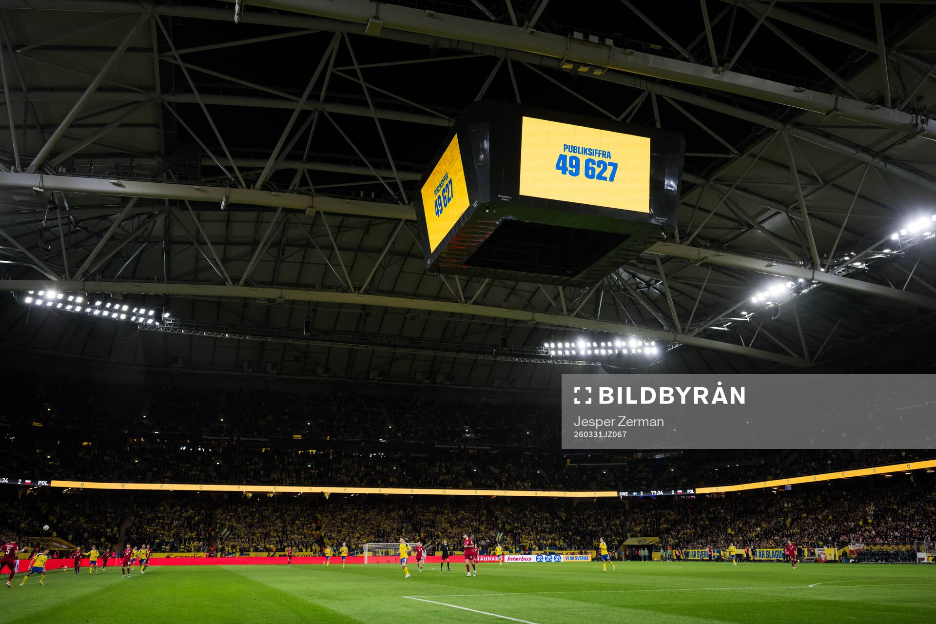 The Jumbotron shows the attendance