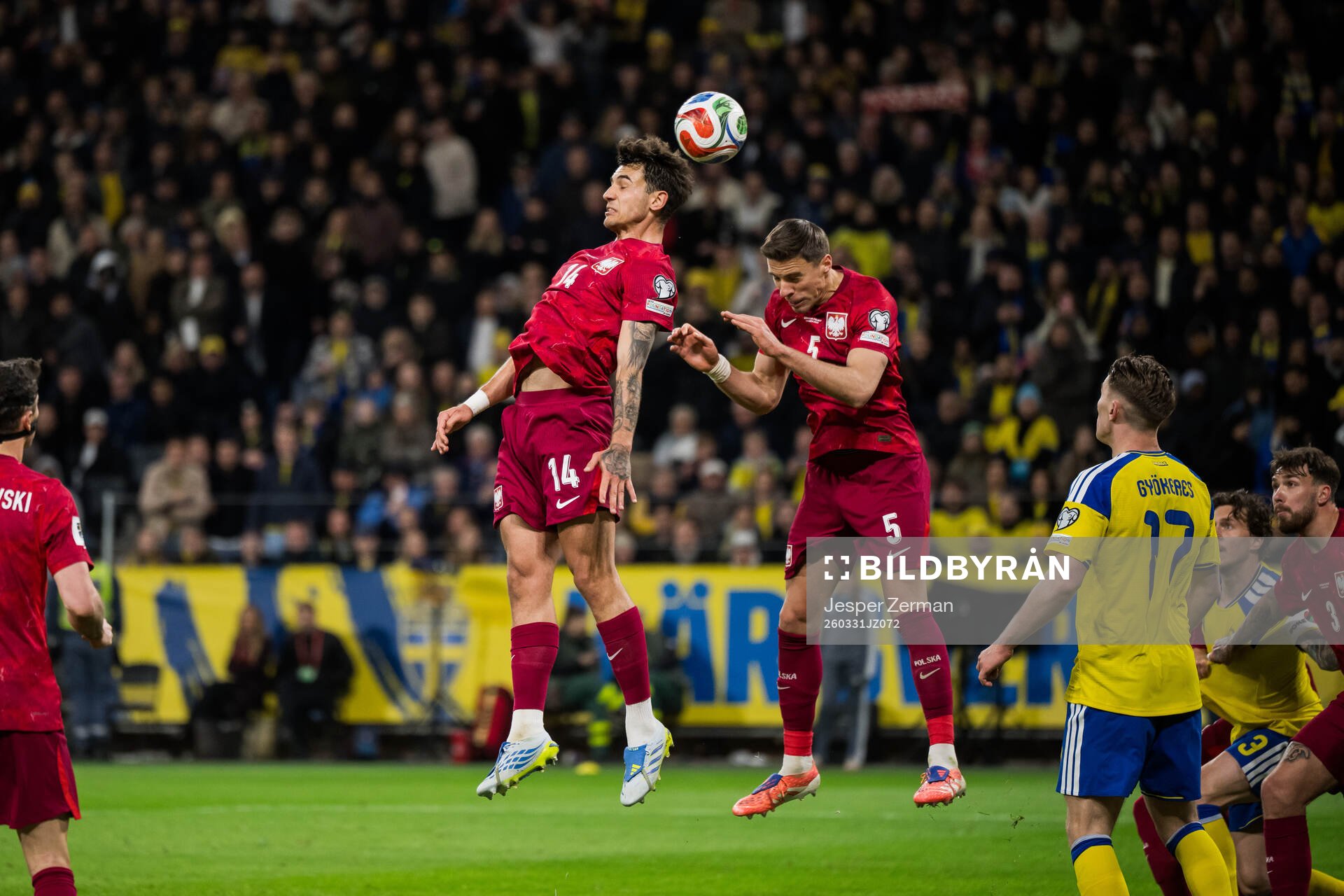 Jakub Kiwior and Jan Bednarek of Poland