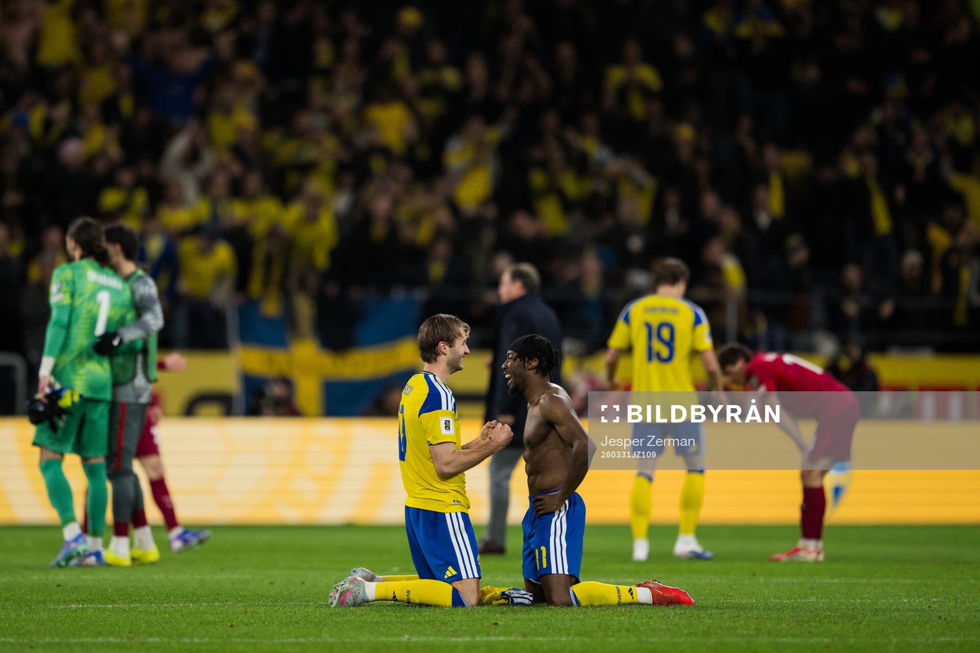 Benjamin Nygren and Anthony Elanga of Sweden celebrate