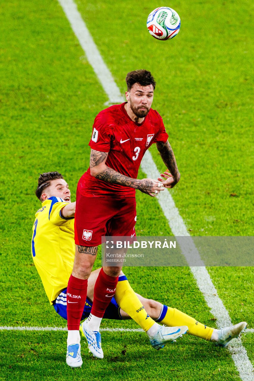 Viktor Gyökeres of Sweden and Przemyslaw Wisniewski of