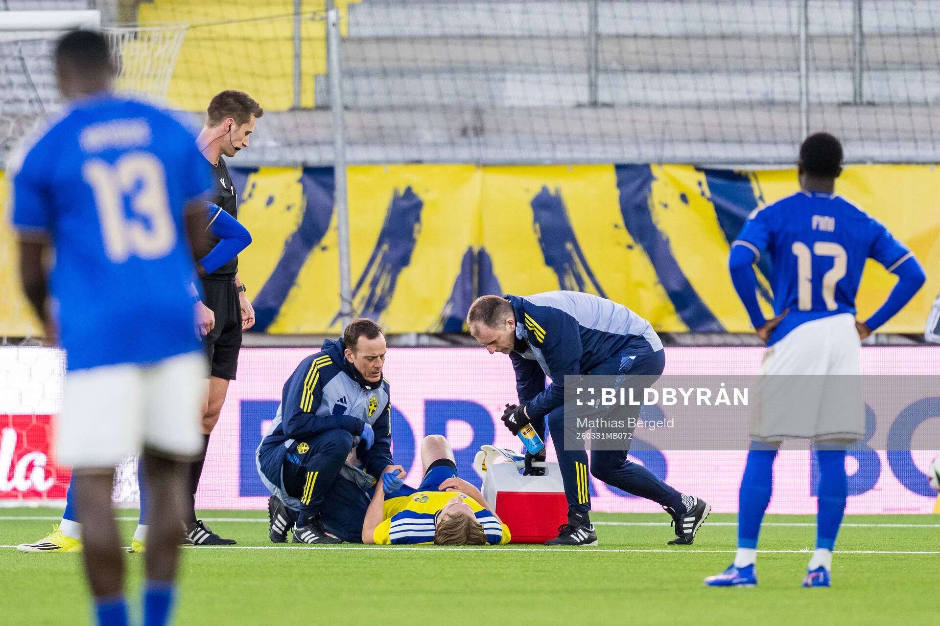 Noah Tolf of Sweden receives medical attention by medical