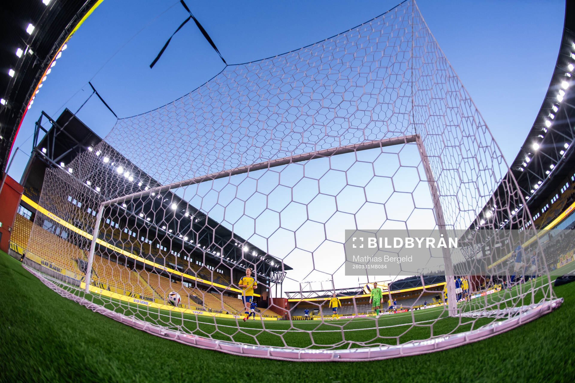 Noah Tolf and goalkeeper Elis Bishesari of Sweden look