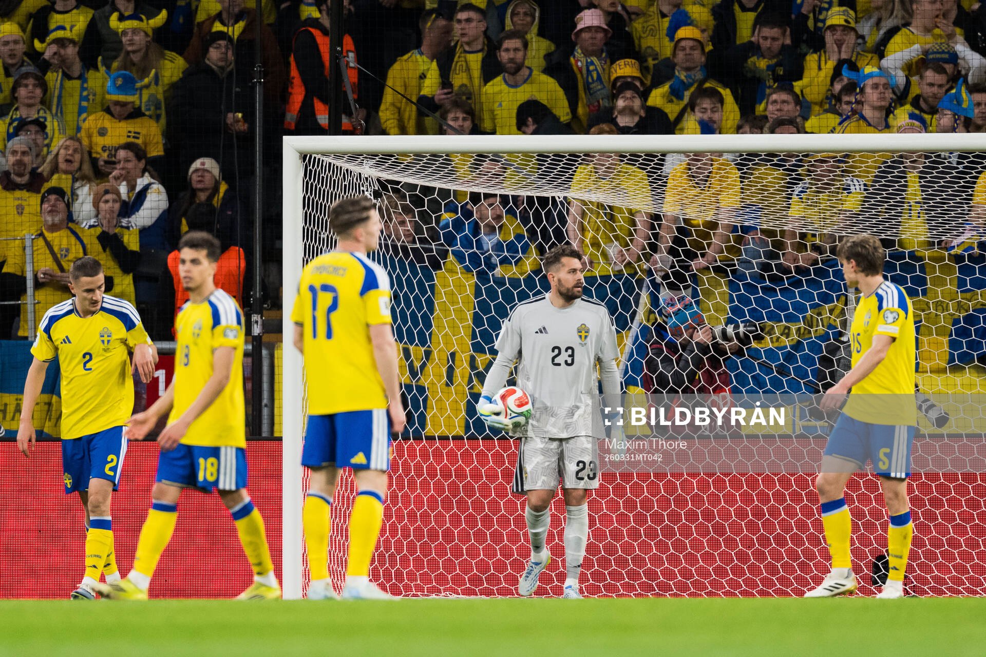 Goalkeeper Kristoffer Nordfeldt of Sweden looks dejected