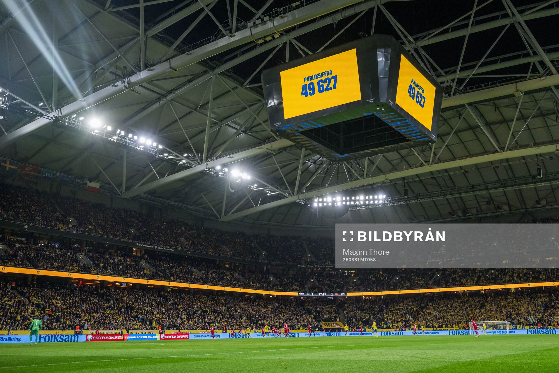 The Jumbotron shows the attendance