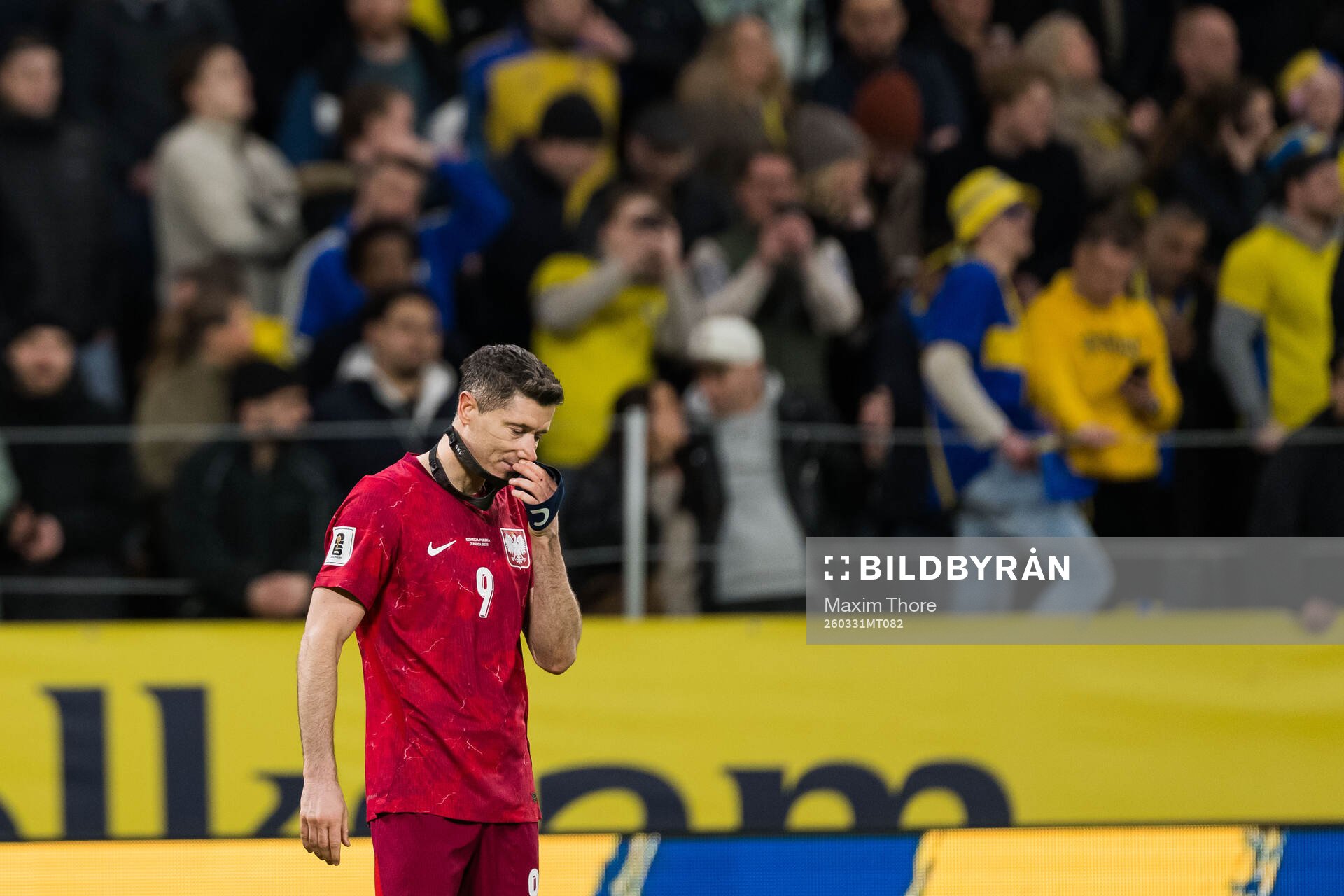 Robert Lewandowski of Poland looks dejected